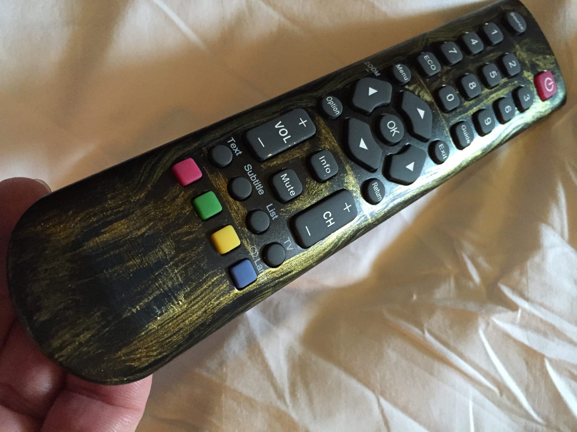A faux metal TV remote