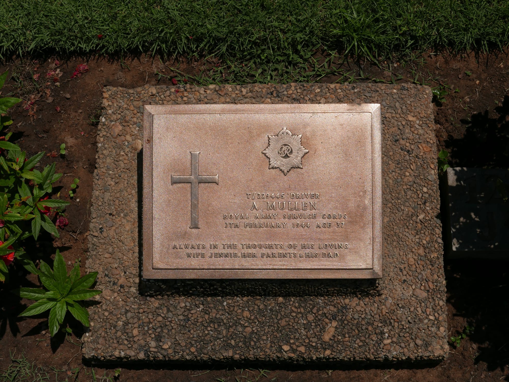 Photo by Author — Repairing the grave markers — the Taukkyan War Cemetery, Yangon (Rangoon), Myanmar (Burma)
