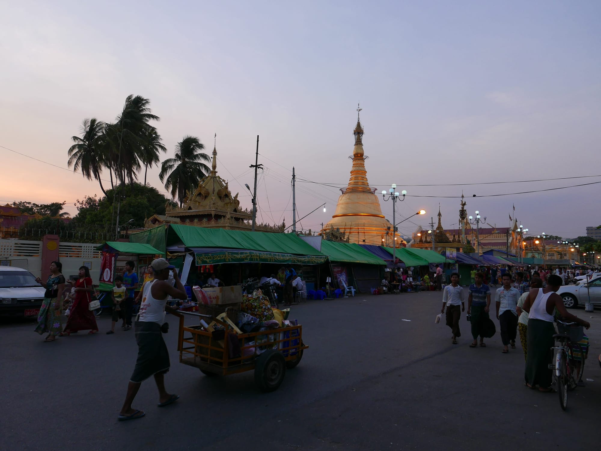 Photo by Author — Local street market — Pagoda in the evening light