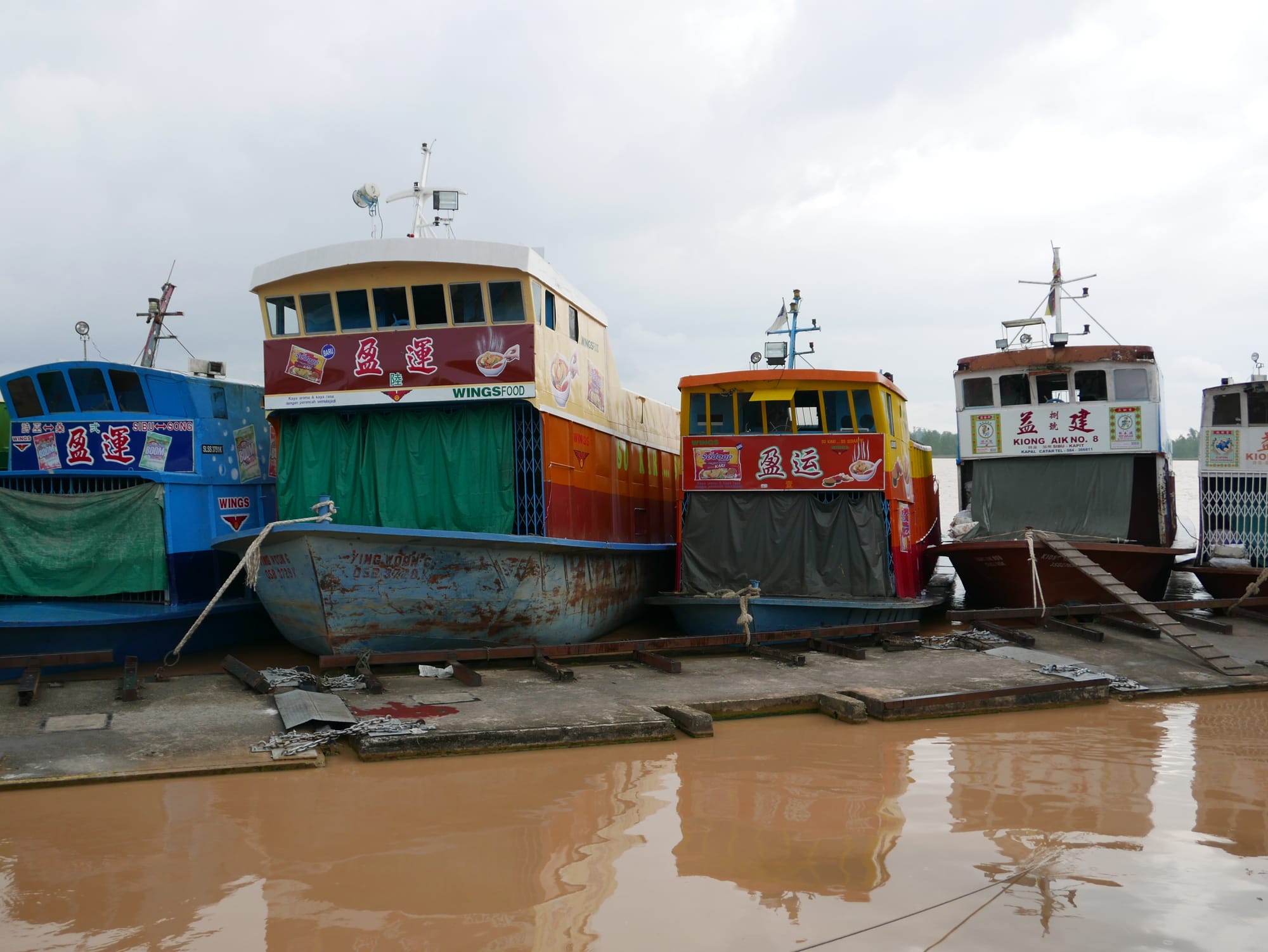Photo by Author — the boats used to ship goods up the Rajang River