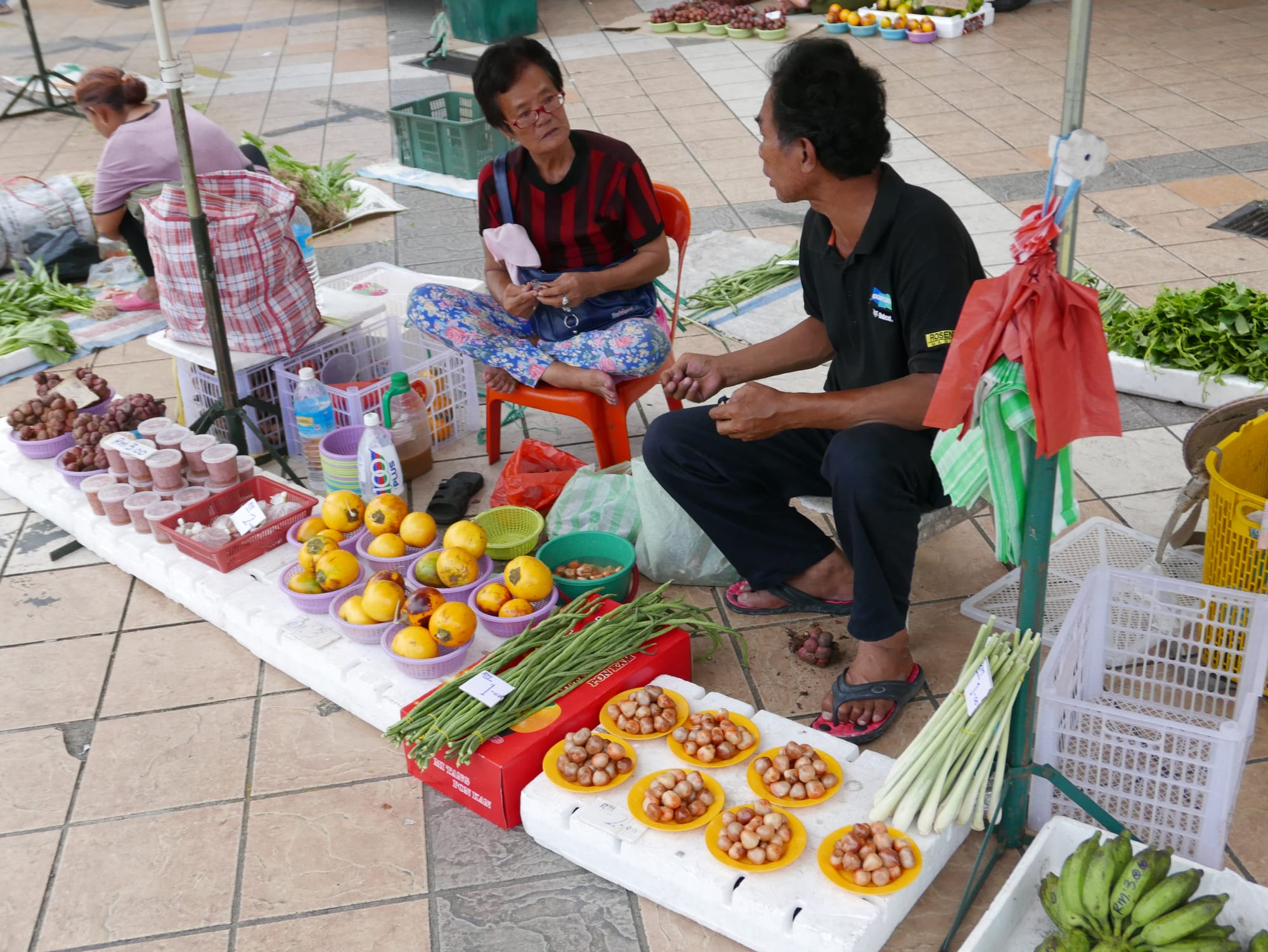 Photo by Author — stall-holders in the Sibu day market