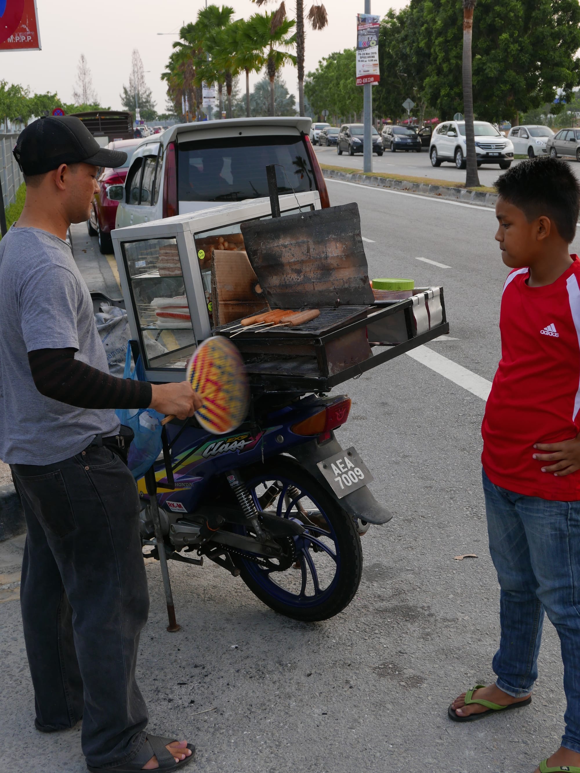 Photo by Author — motorbike hot food seller — Queensbay Seaside, Bayan Lepas, Penang, Malaysia