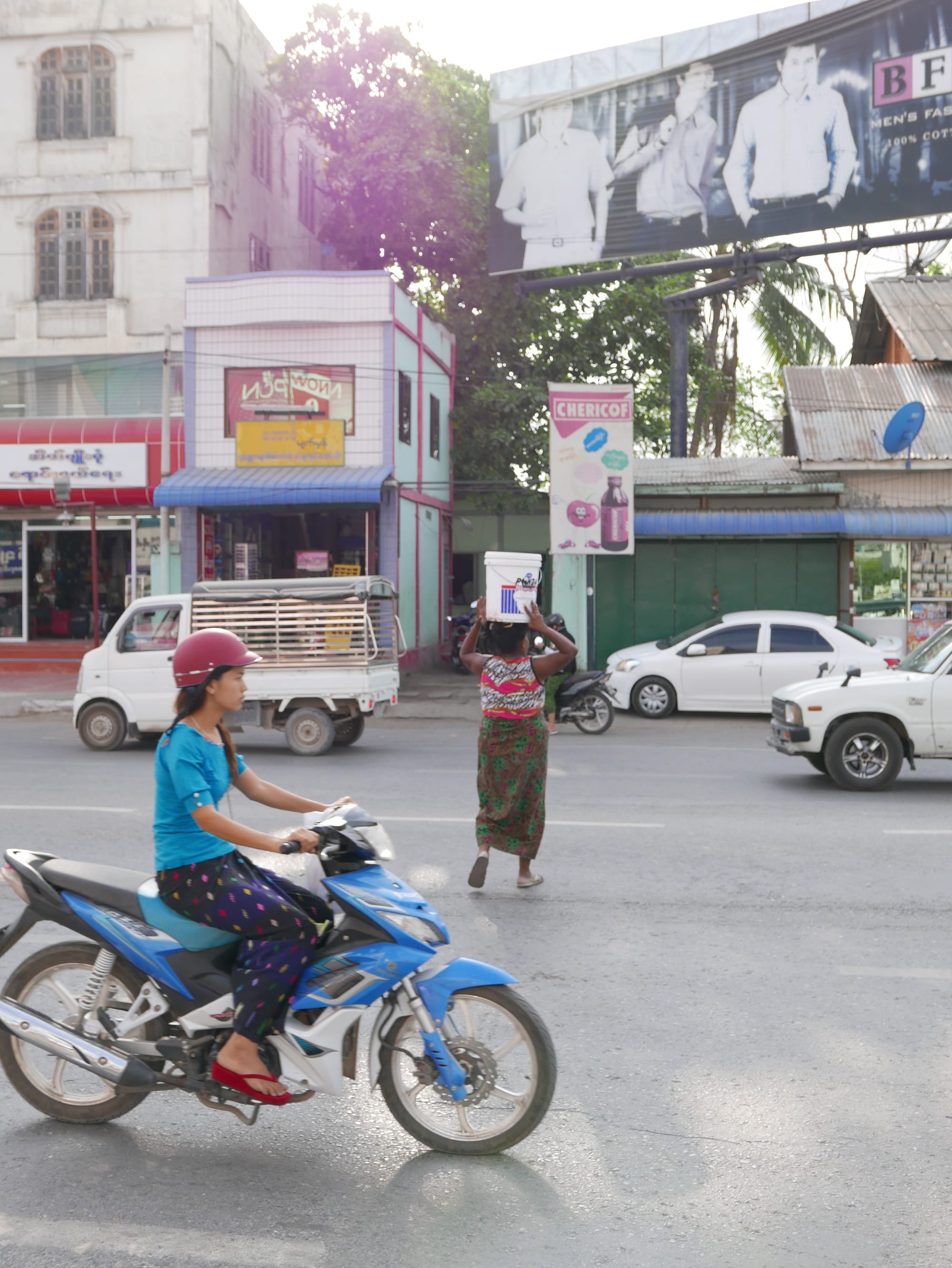 Photo by Author — crossing the road in Mandalay