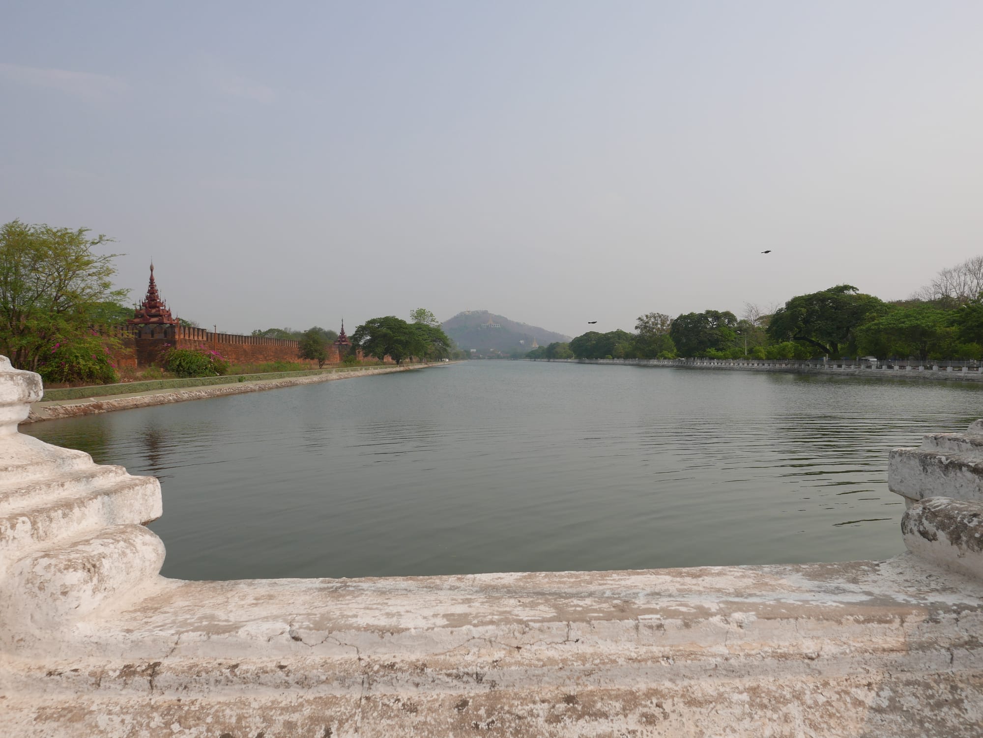 Photo by Author — looking down the moat of Mandalay Grand Royal Palace towards Mandalay Hill