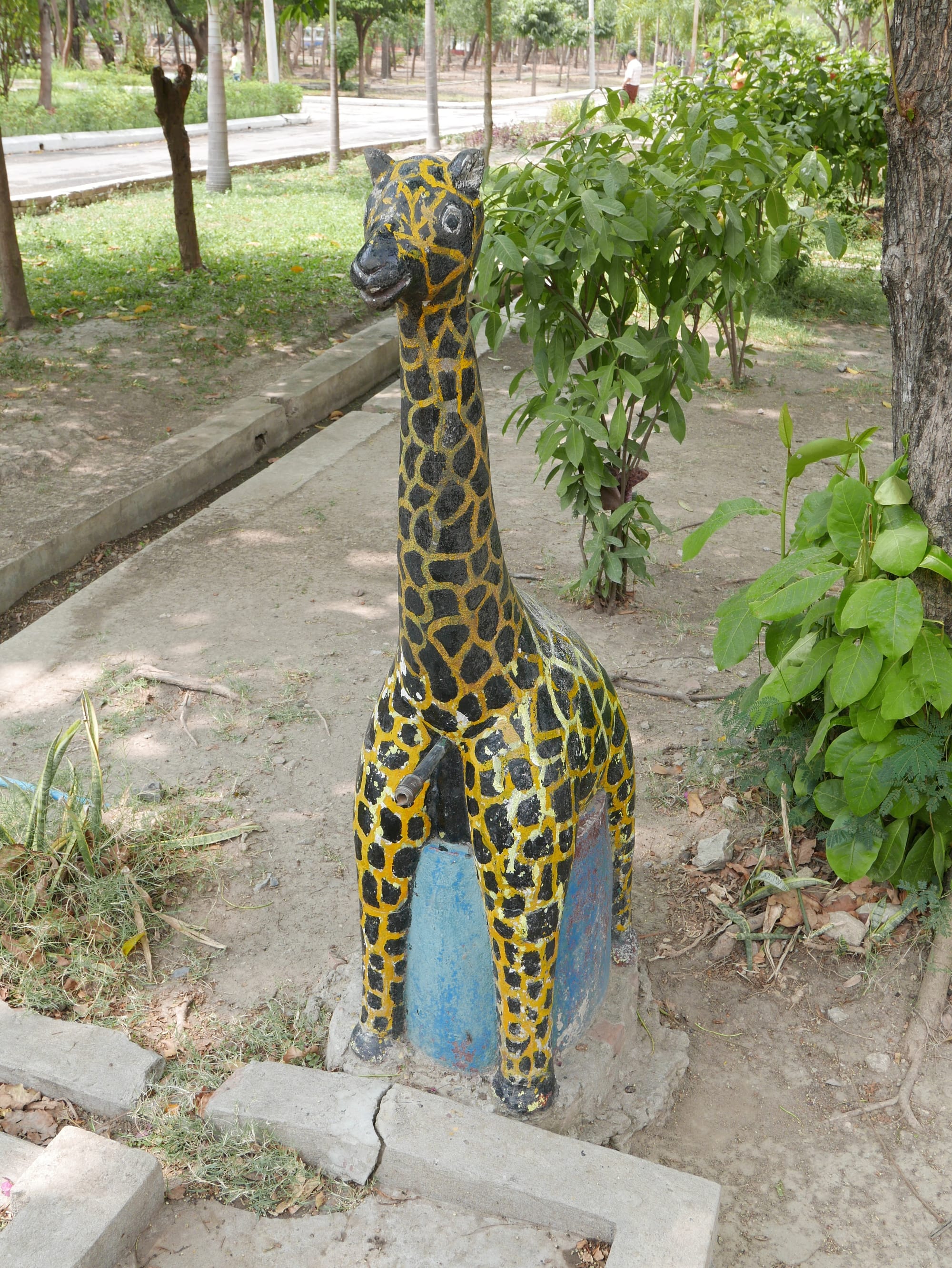 Photo by Author — a giraffe date fountain at Yadanabon Zoo, Mandalay, Myanmar