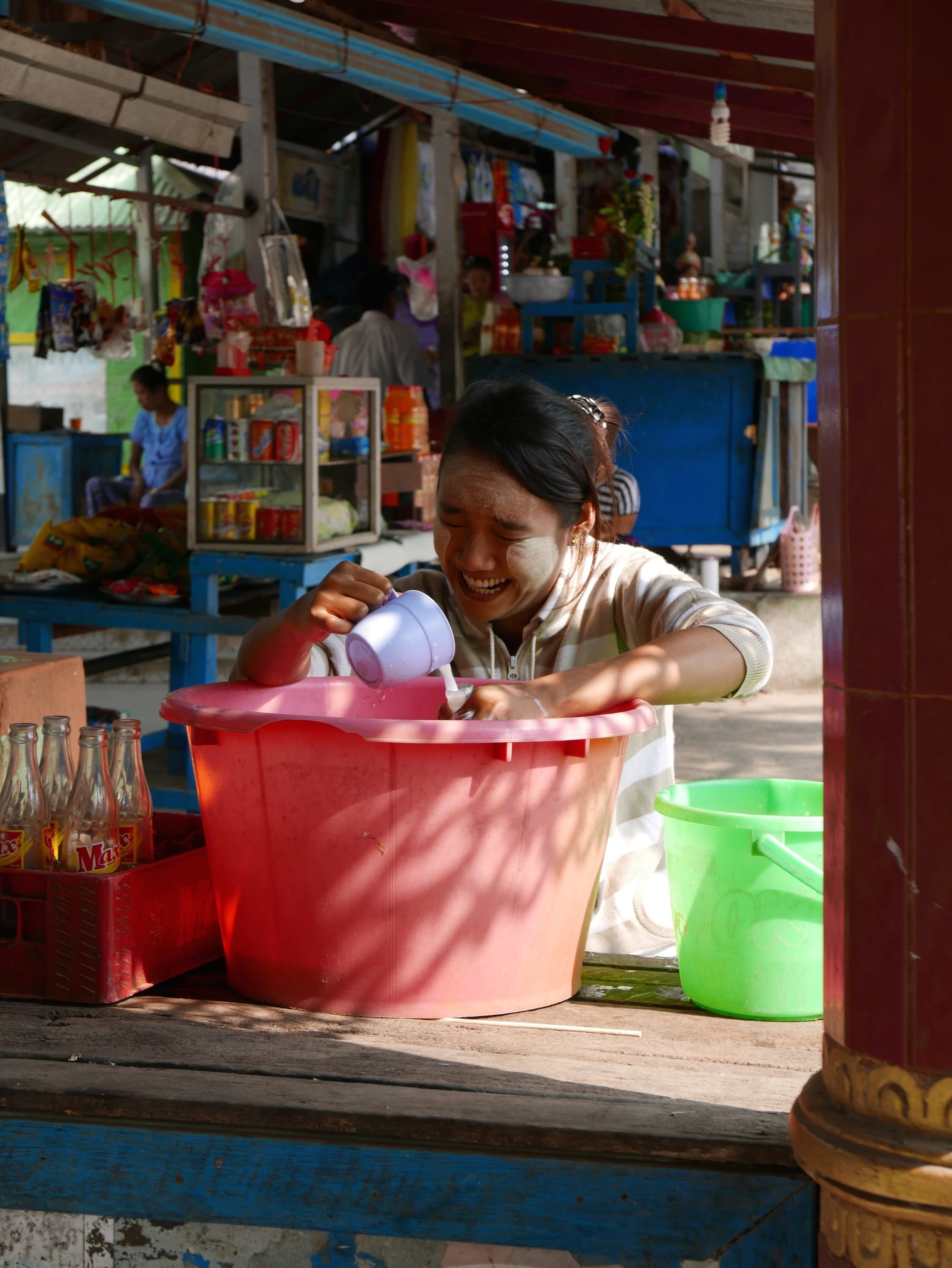 Photo by Author — waitress wearing thanaka — Myanmar (Burma)