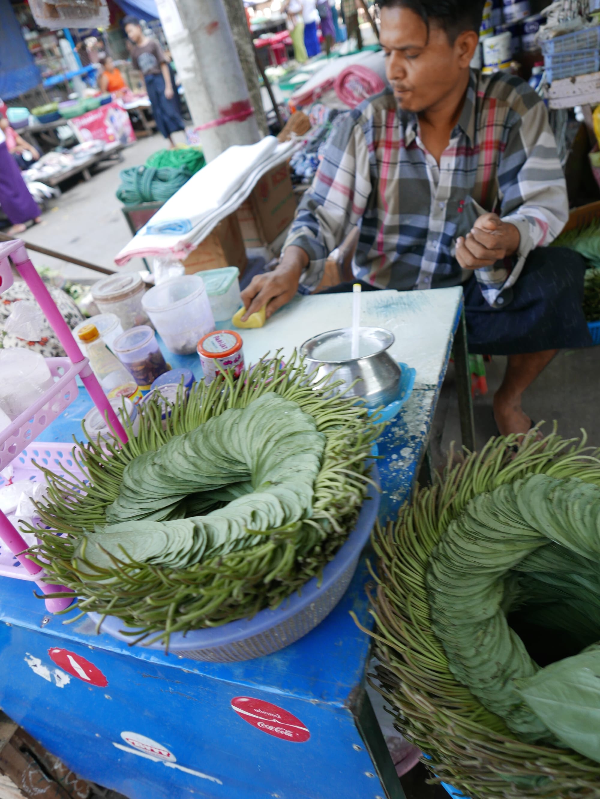 Photo by Author — a betel quid seller preparing for a busy evening — Myanmar (Burma)