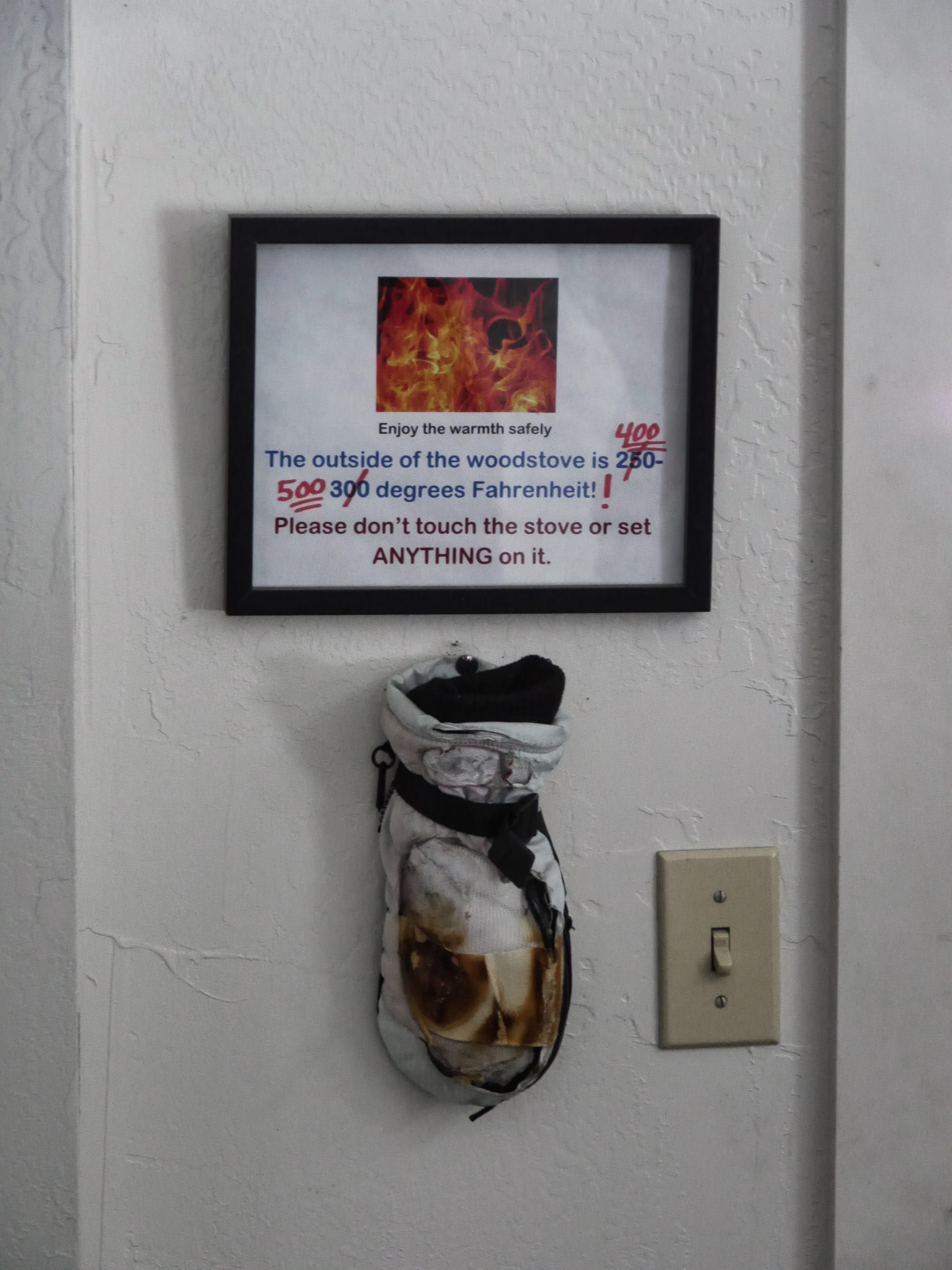 Photo by Author — a warning about the stove in the warming hut at West Thumb Geyser Basin