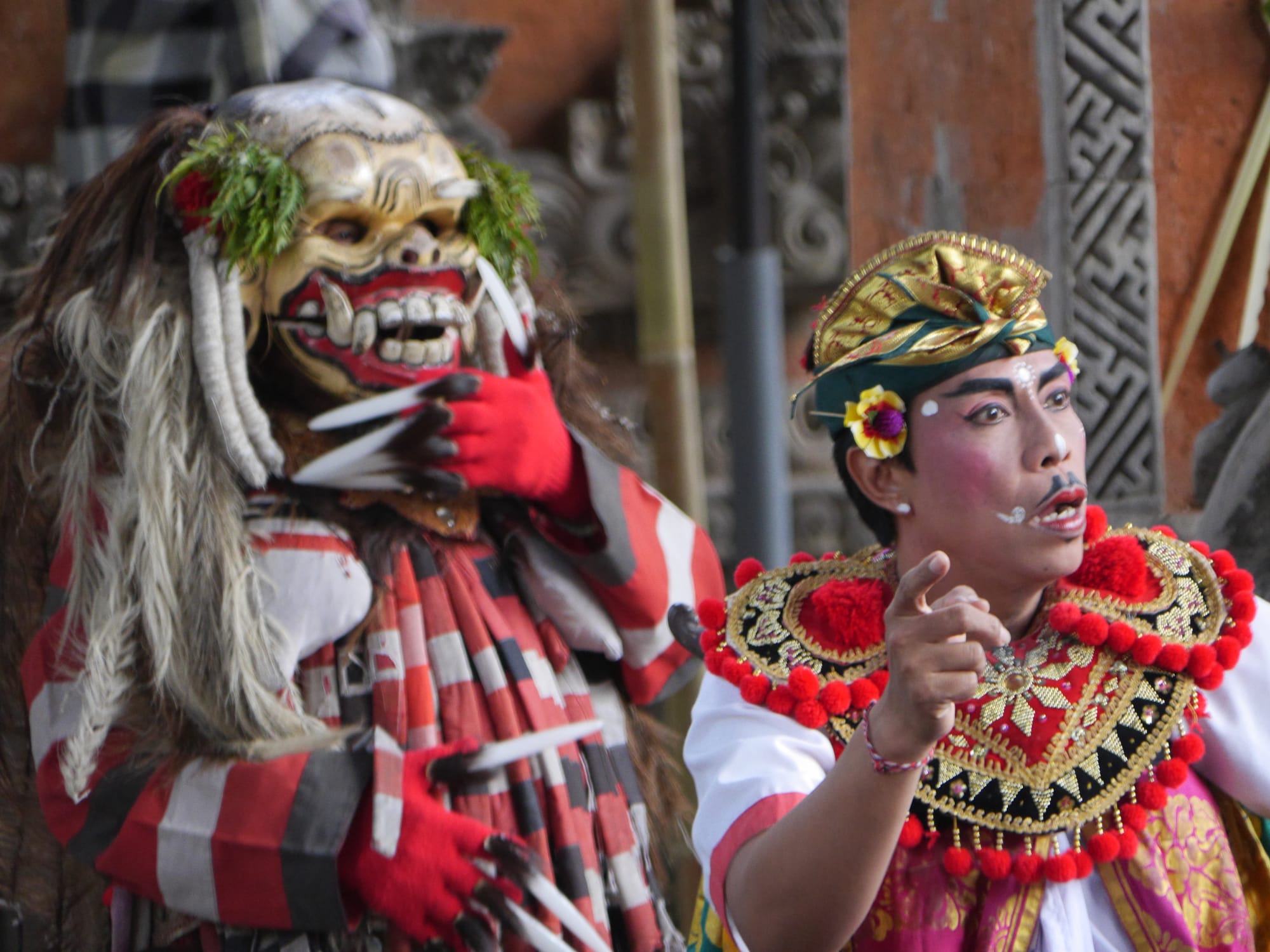 Photo by Author — Rangda sneaking up on a servant — Sahadewa Barong and Kris Dance, Bali, Indonesia