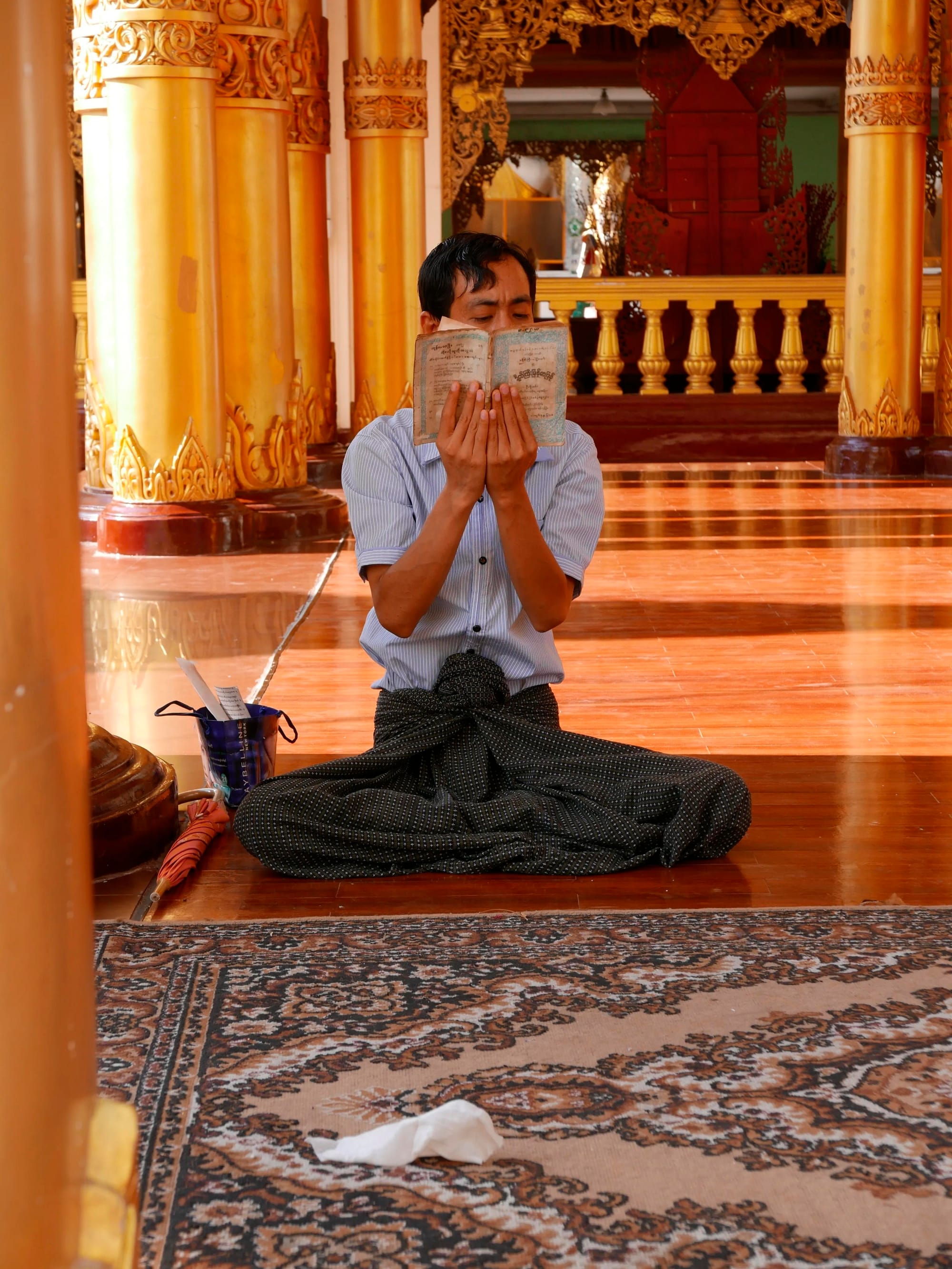 Photo by Author — studying at the Shwedagon Pagoda