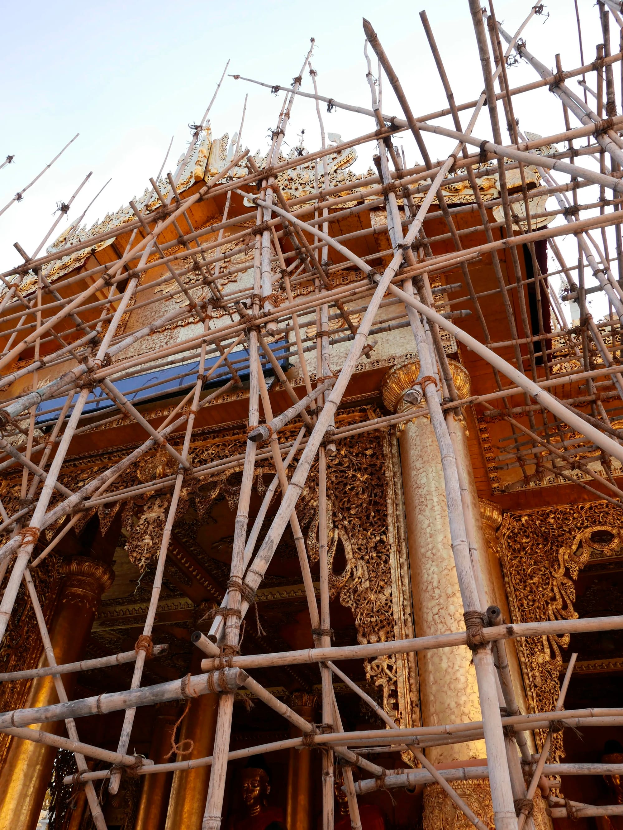 Photo by Author — scaffolding and repair work at the Shwedagon Pagoda