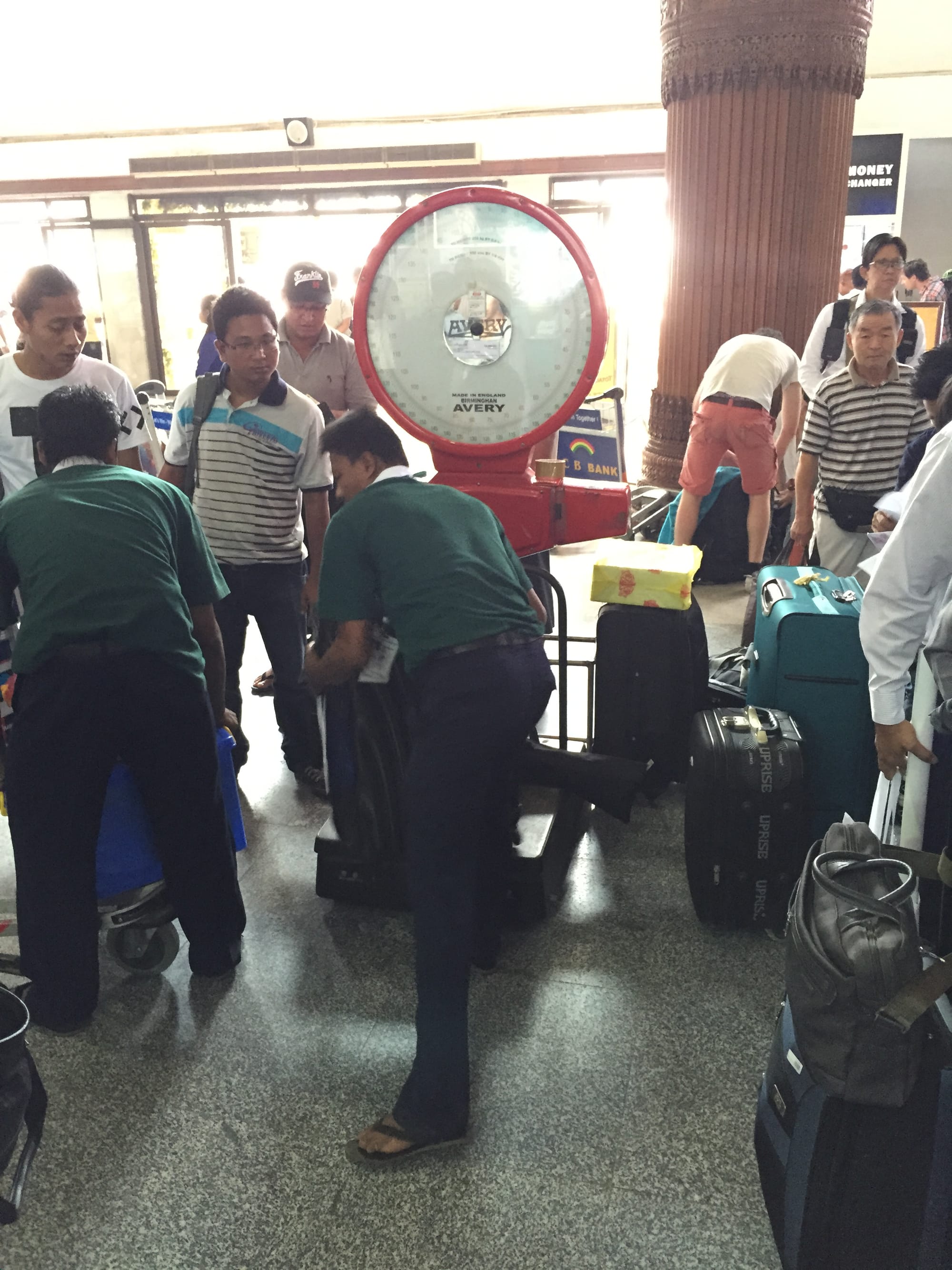 Photo by Author — baggage scales at the Air Bagan check-in, Yangon (Rangoon) Airport