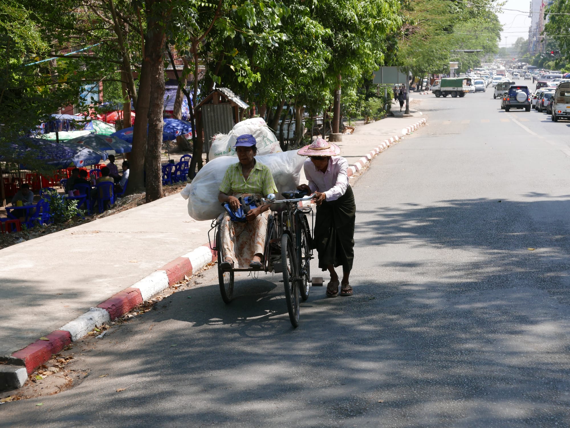 Photo by Author — bike taxi with goods — Myanmar (Burma)