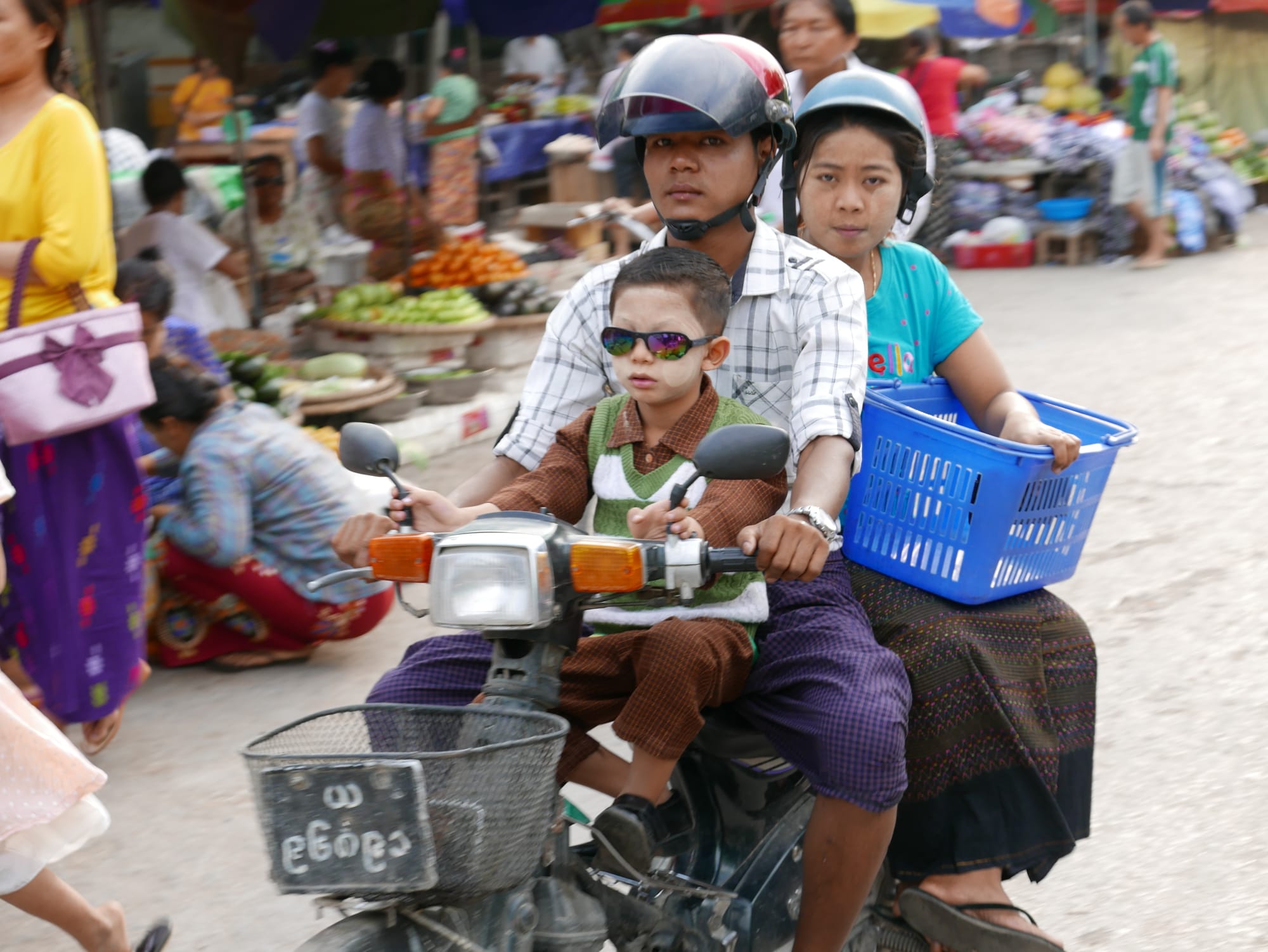 Photo by Author — cool kid on a bike — motorbikes of Mandalay