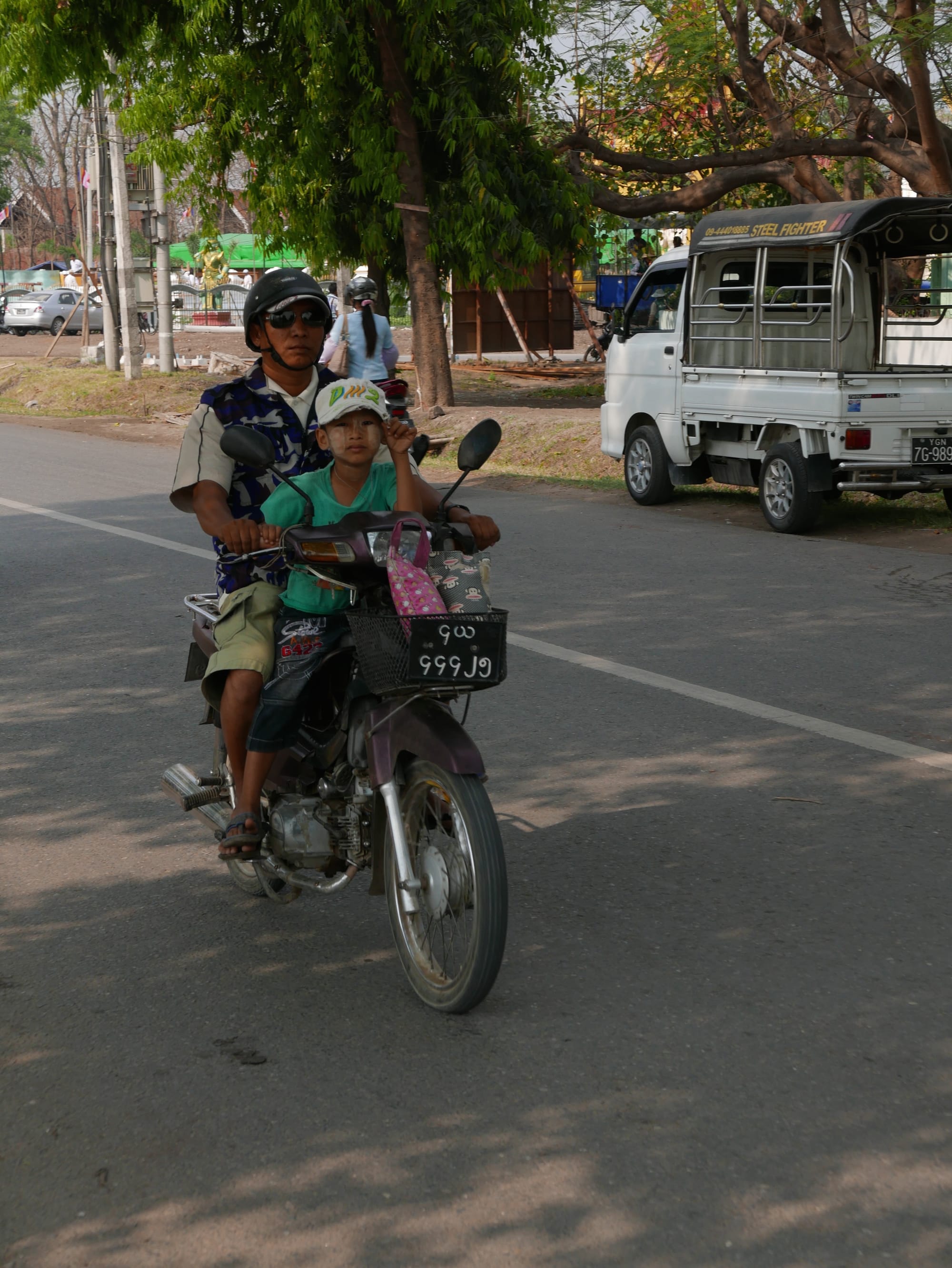 Photo by Author — kid on a bike — motorbikes of Mandalay