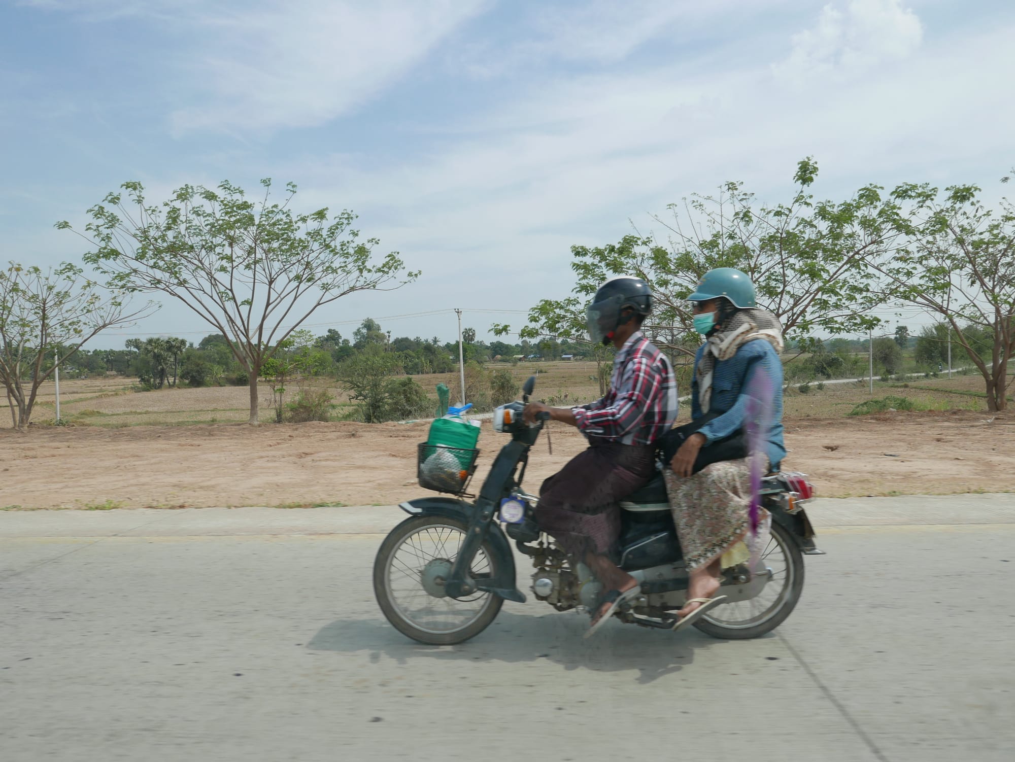 Photo by Author — riding side-saddle — motorbikes of Mandalay
