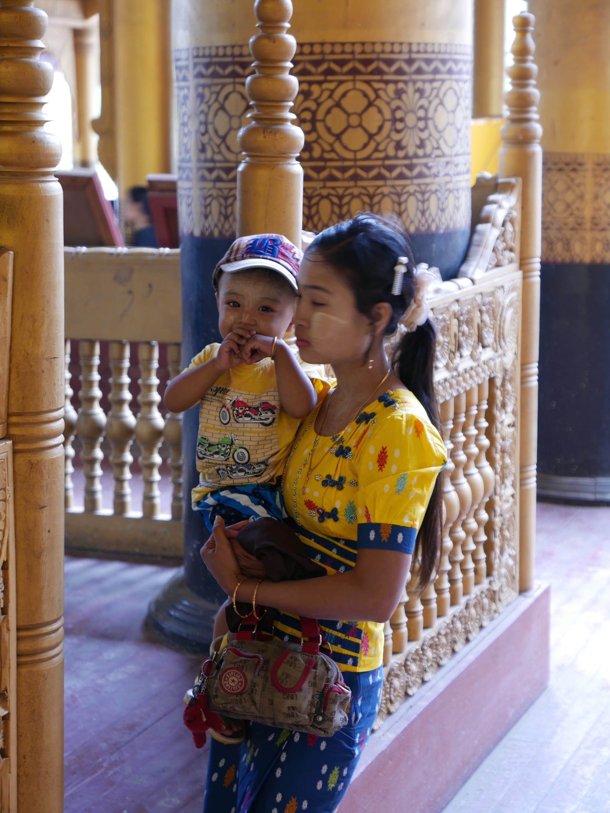 Photo by Author — mother and child with thanaka on their faces — Myanmar (Burma)
