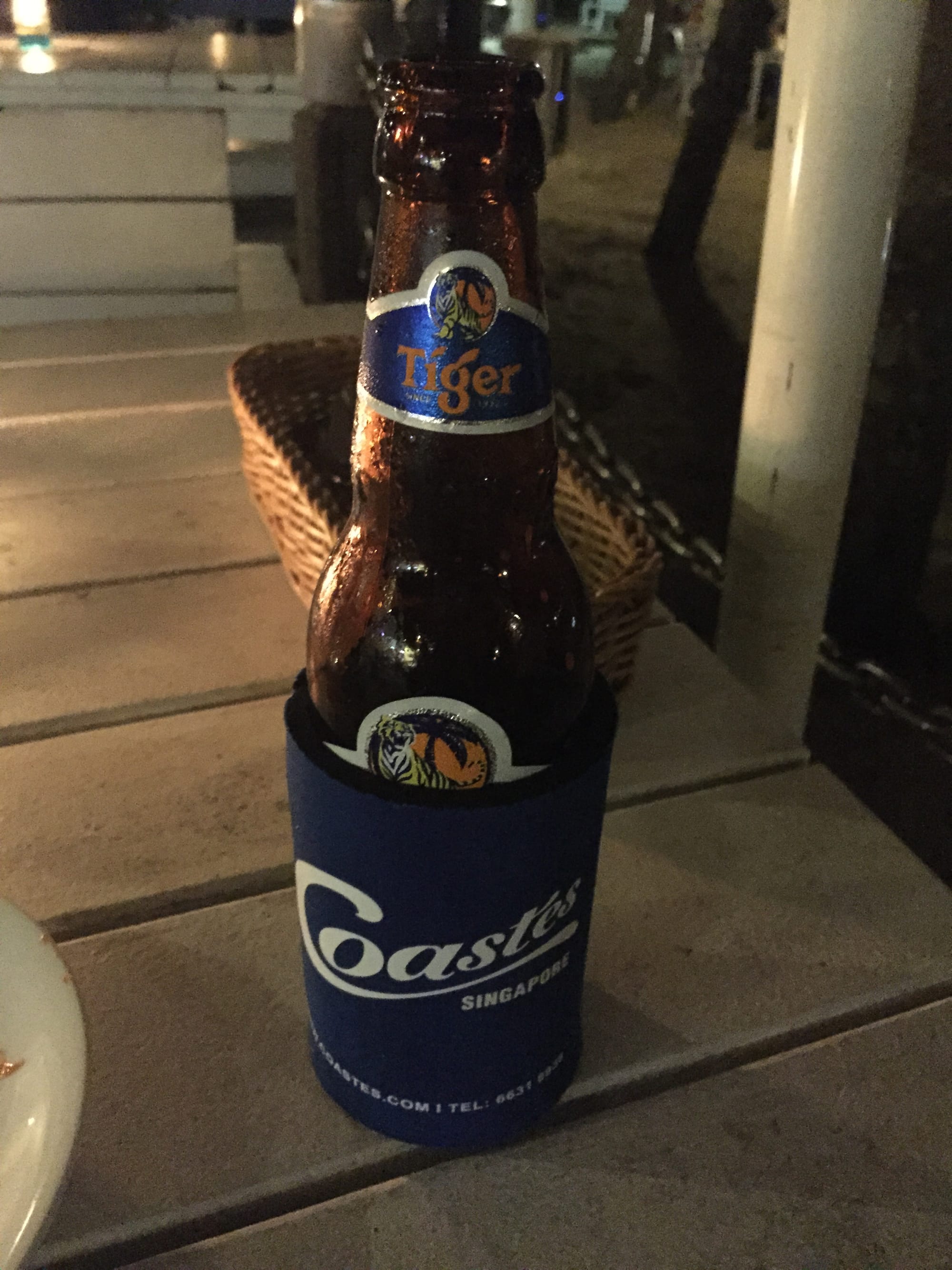 Photo by Author — and my beer — Coastes, Siloso Beach, Singapore