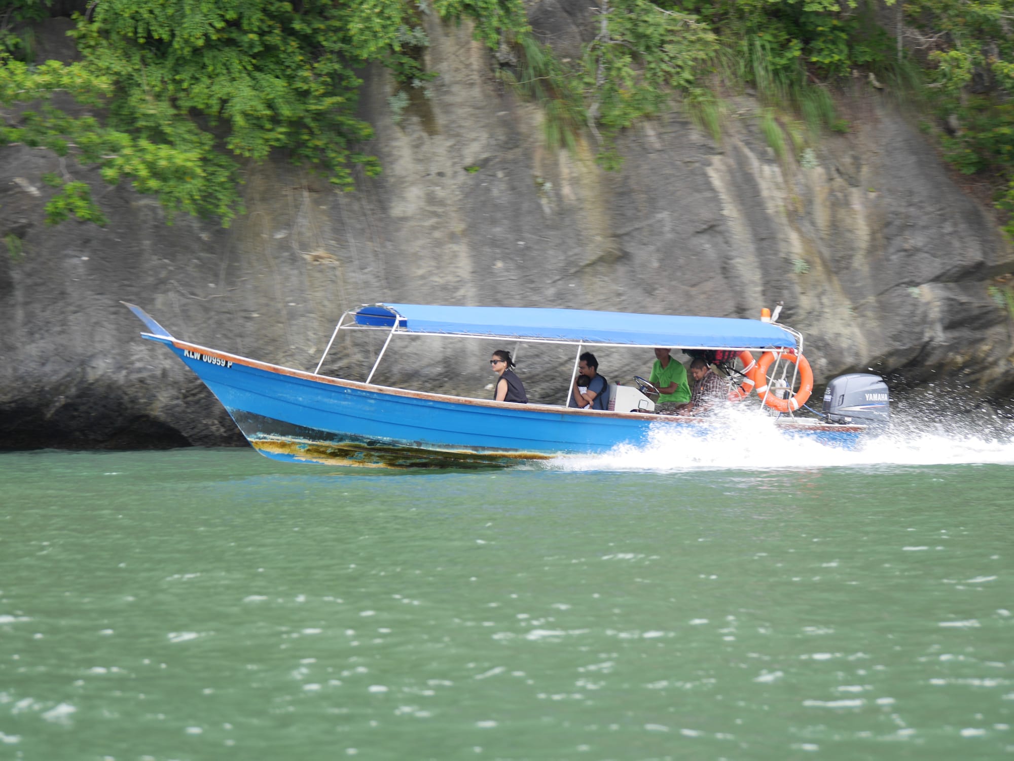 Photo by Author — speeding tour boats — Tg Rhu Mangrove Tour, Langkawi, Malaysia