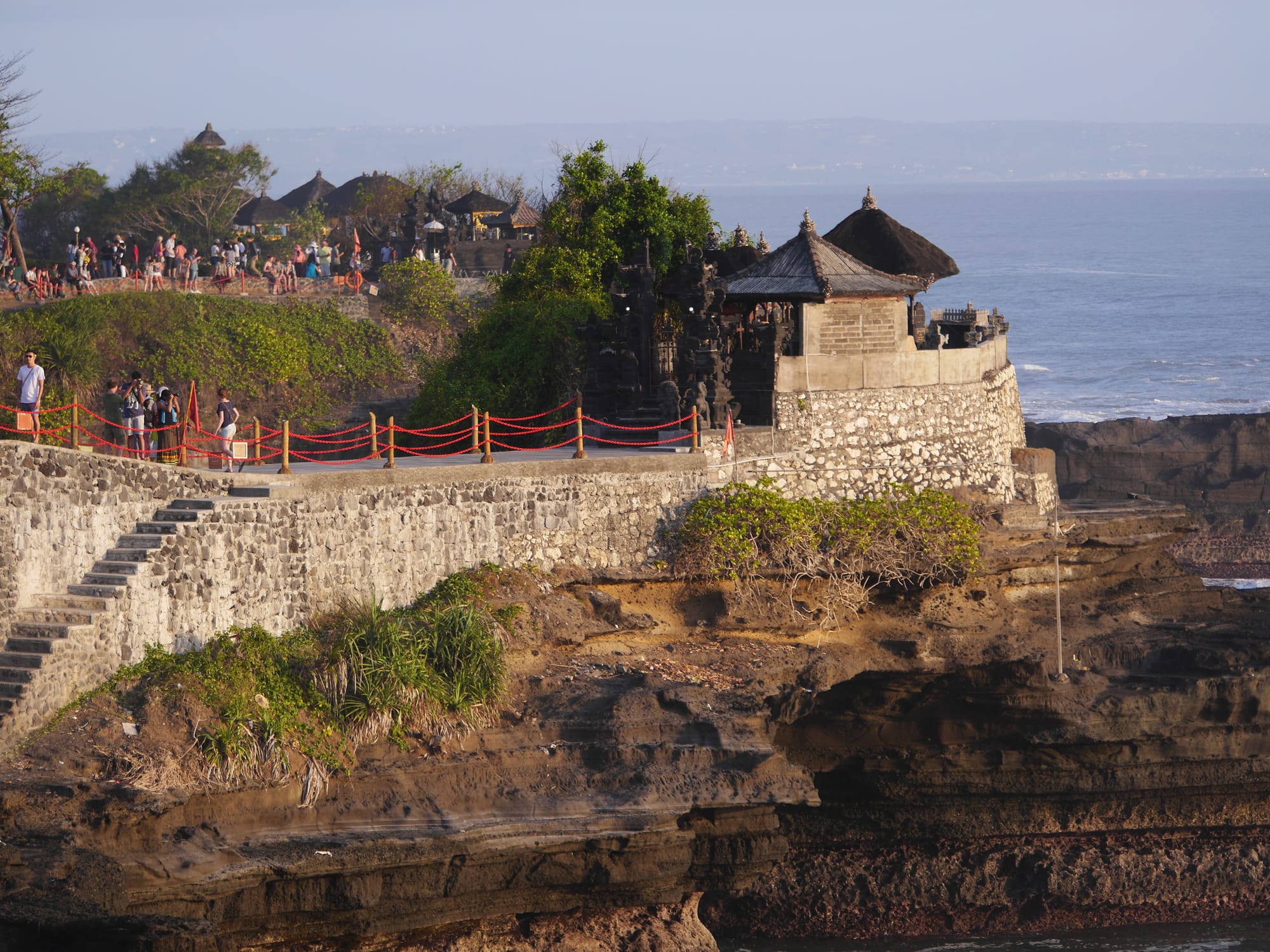 Photo by Author — the cliff tops— Tanah Lot, Bali, Indonesia