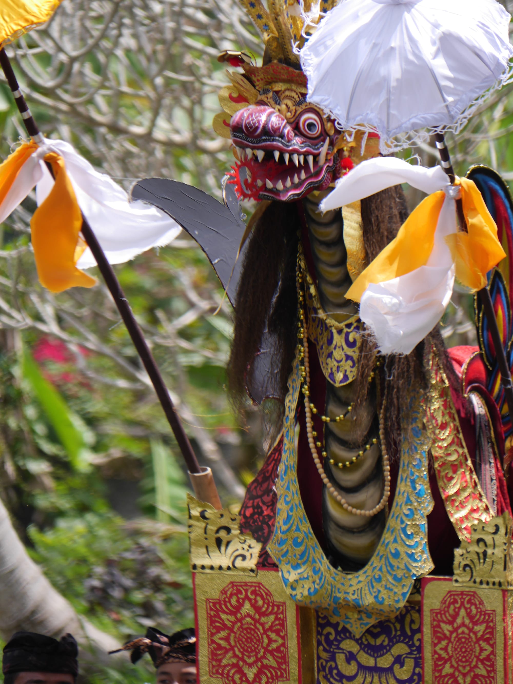 Photo by Author — a dragon’s head — a cremation procession in Bali