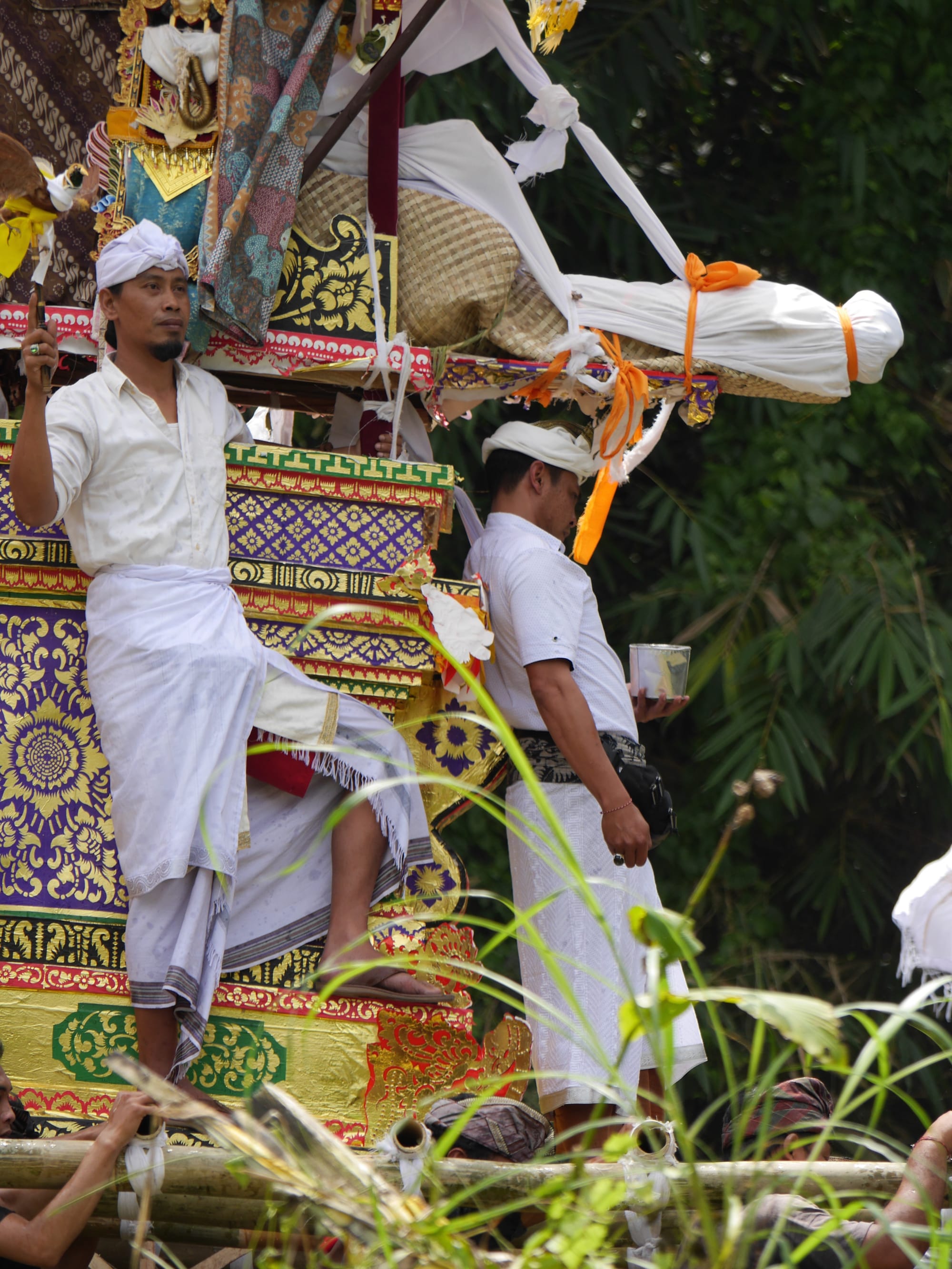 Photo by Author — mourners at a cremation procession in Bali