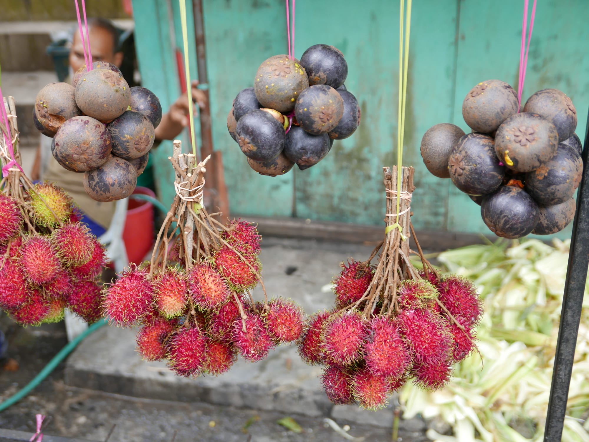 Photo by Author — mangosteens and rambutans on sale — driving up to the Cameron Highlands in Malaysia