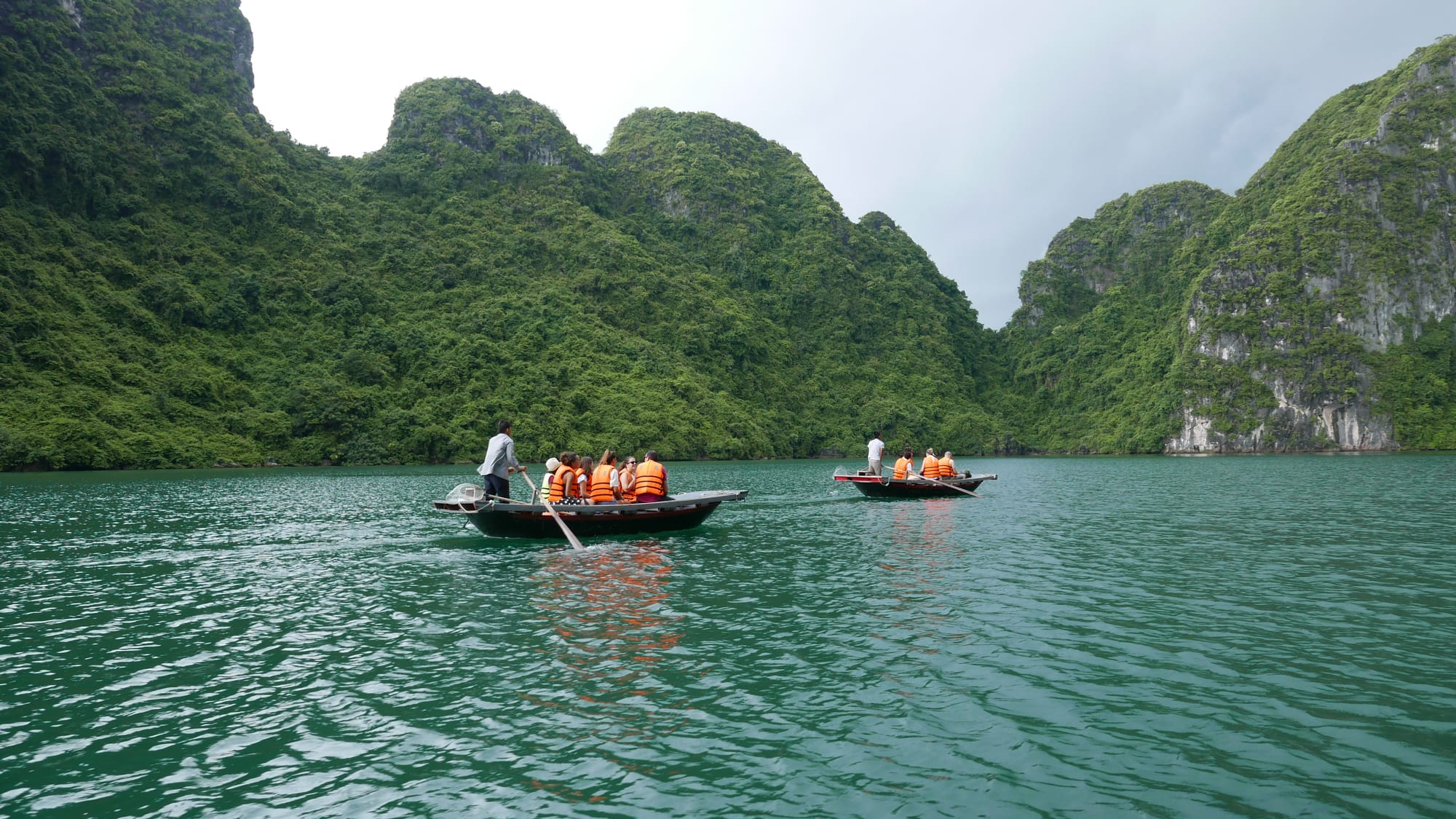 Photo by Author — being rowed to the fishing village museum, Ha Long Bay, Vietnam