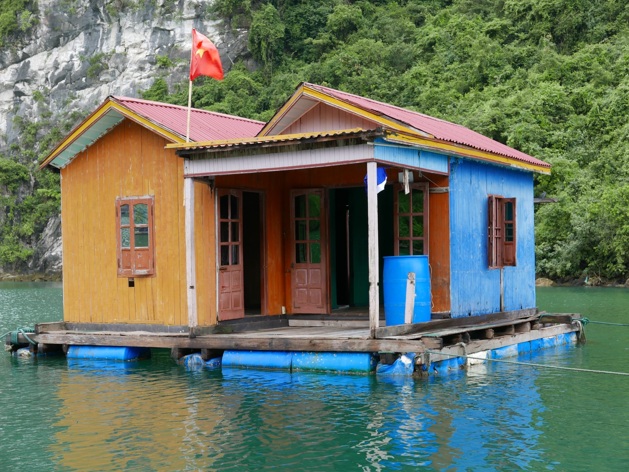 Photo by Author — a house in a fishing village, Ha Long Bay, Vietnam