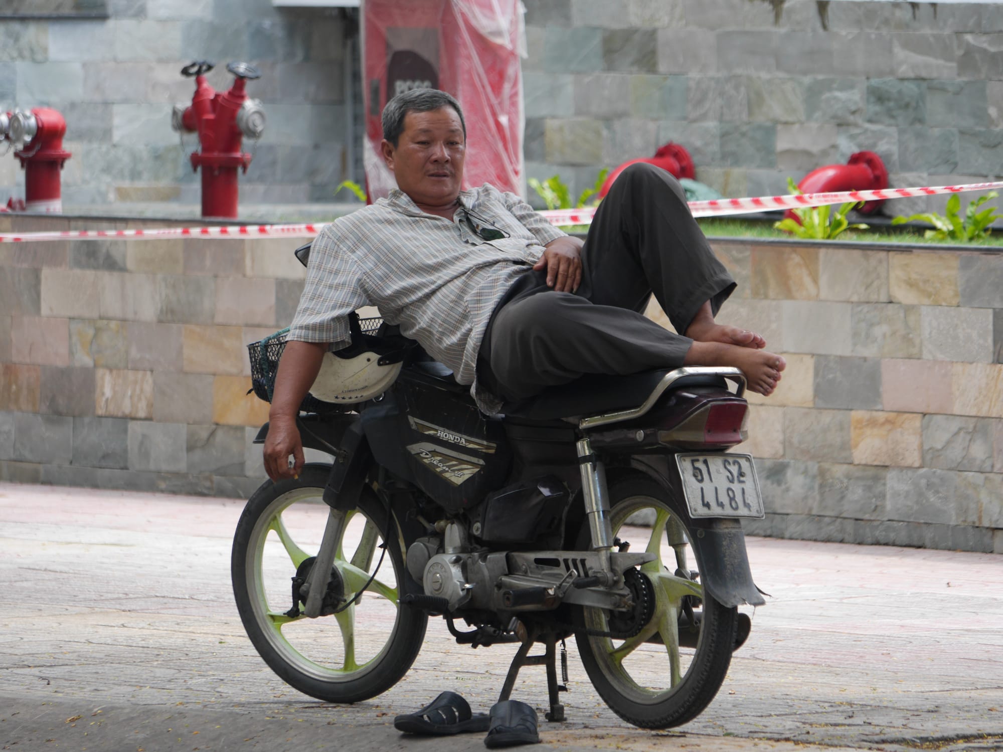 Photo by Author — relaxing on your bike — photos from around Ho Chi Minh City (Saigon), Vietnam