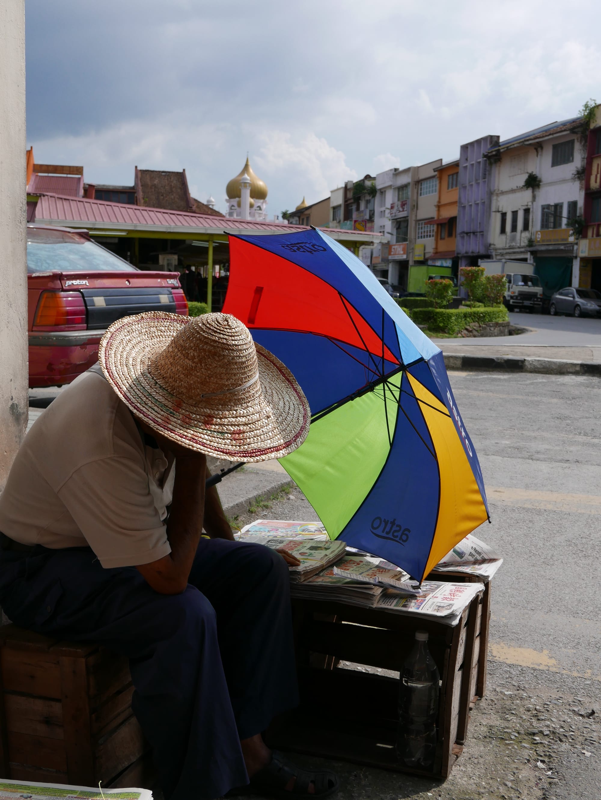 Photo by Author — newspaper seller — India Street, Kuching, Sarawak, Malaysia