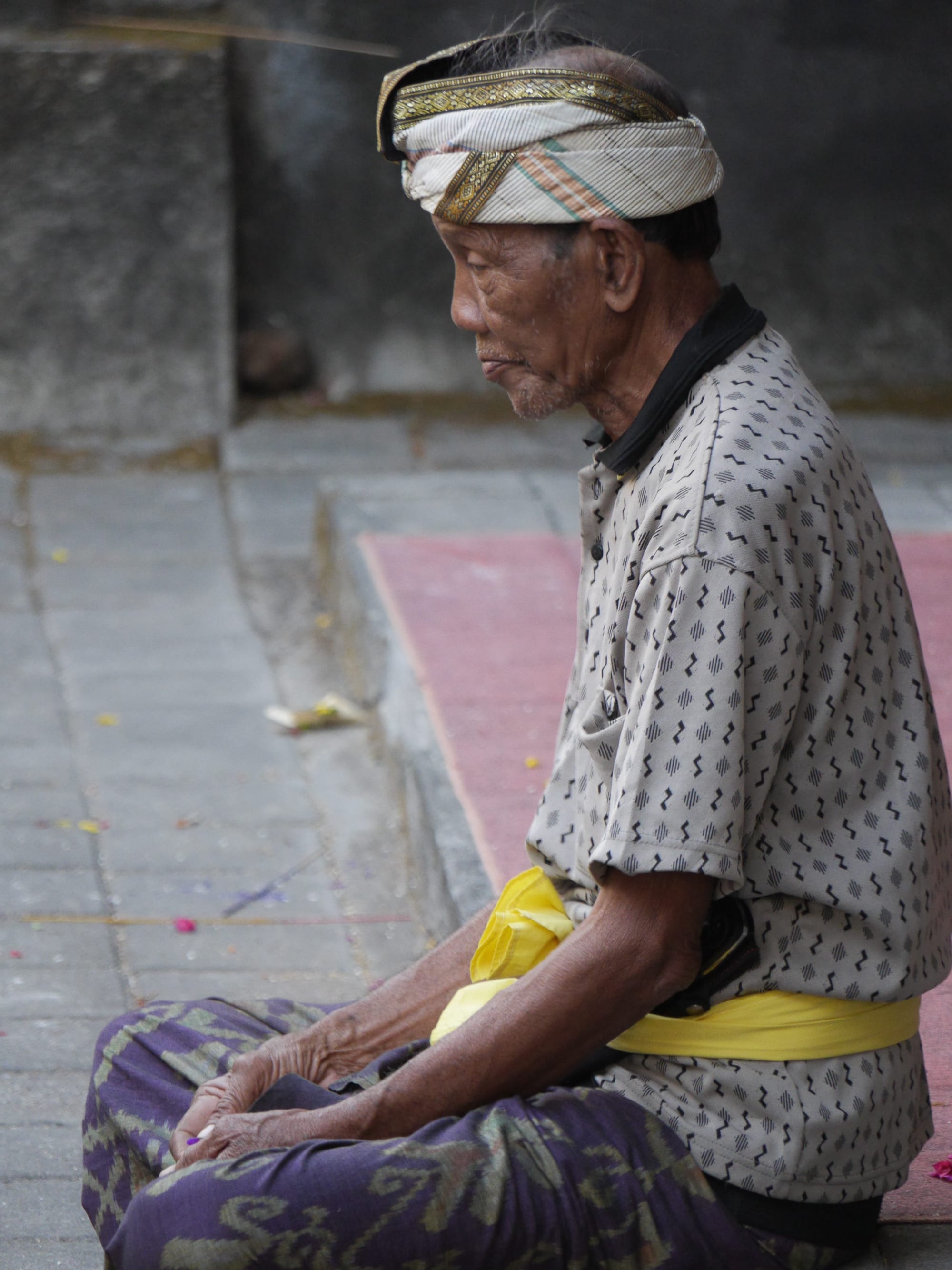 Photo by Author — a worshipper — Tanah Lot, Bali, Indonesia