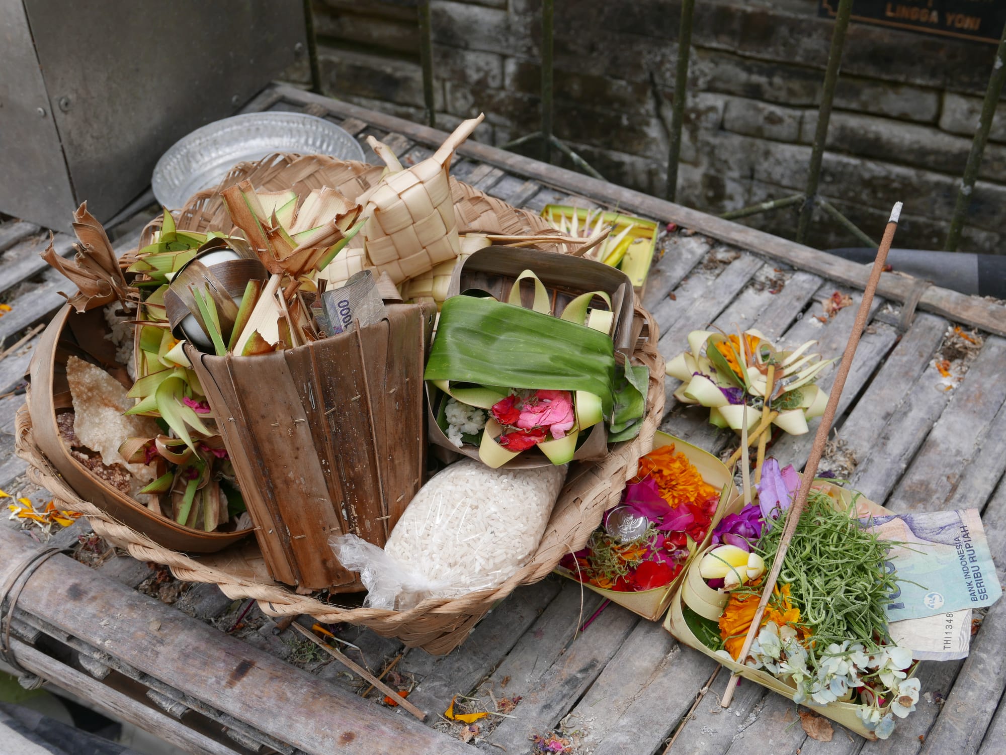 Photo by Author — offerings at the Lingga-yoni — Pura Tirta Empul (Tirta Empul Temple), Bali, Indonesia