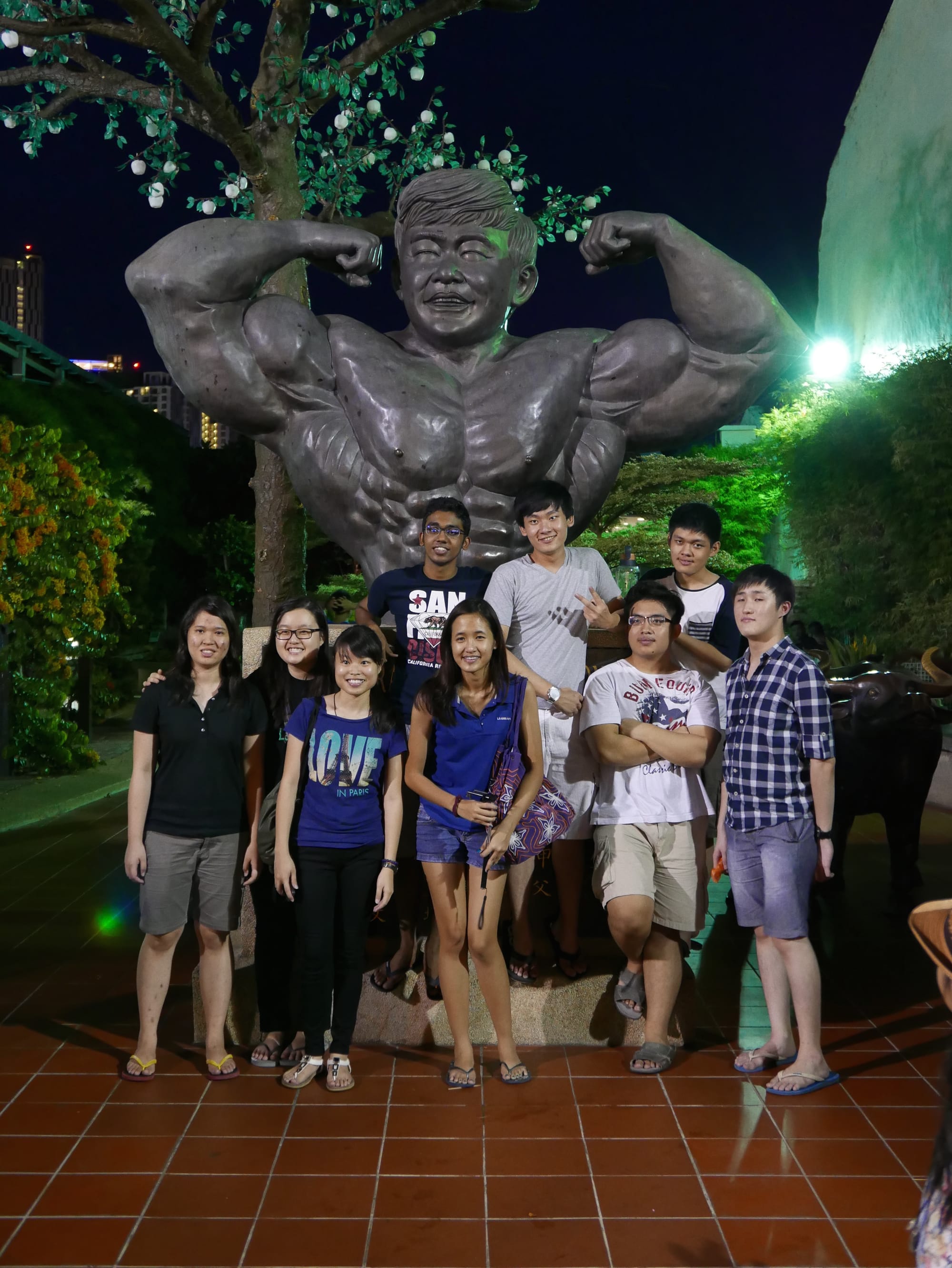 Photo by Author — muscle-bound statue — Night Market, Malacca, Malaysia