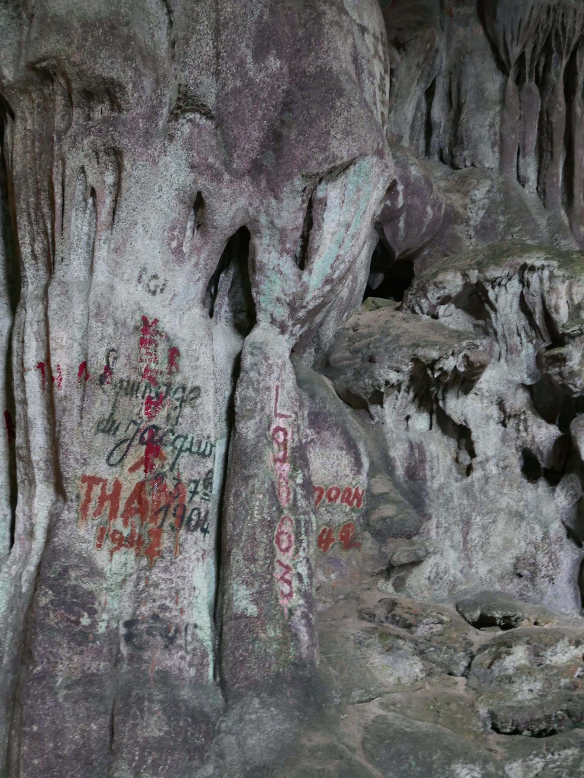 Photo by Author — old graffiti — The Surprise Cave, Ha Long Bay, Vietnam
