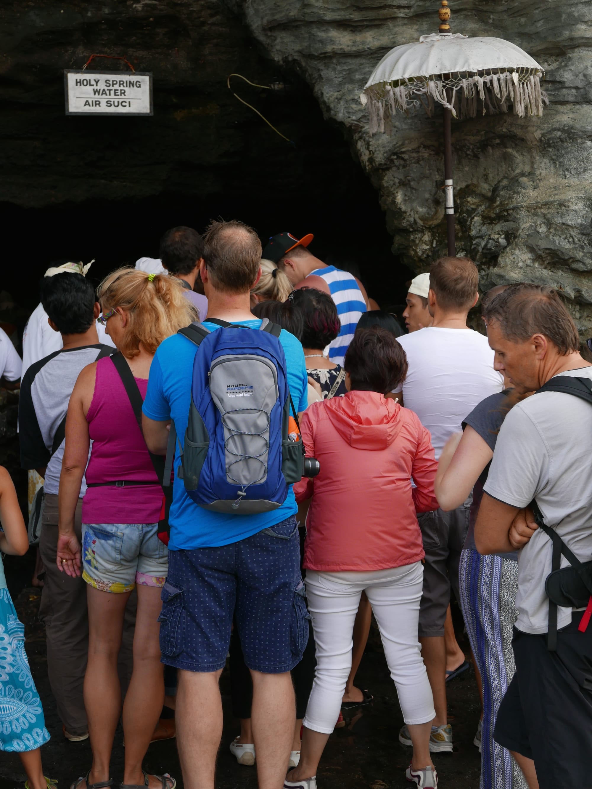 Photo by Author — the queue for the blessing at the holy spring — Tanah Lot, Bali, Indonesia