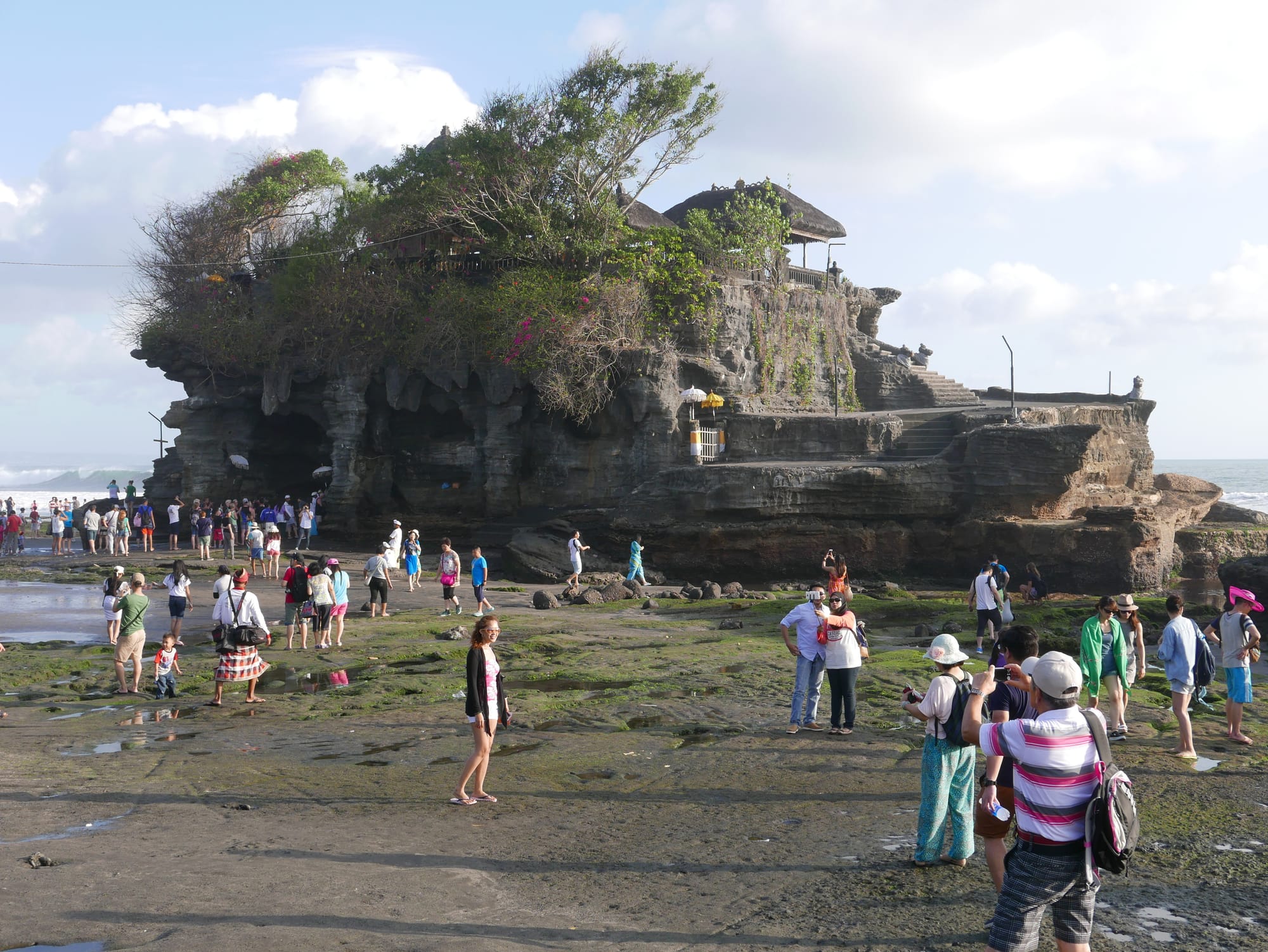 Photo by Author — tourists at Tanah Lot, Bali, Indonesia