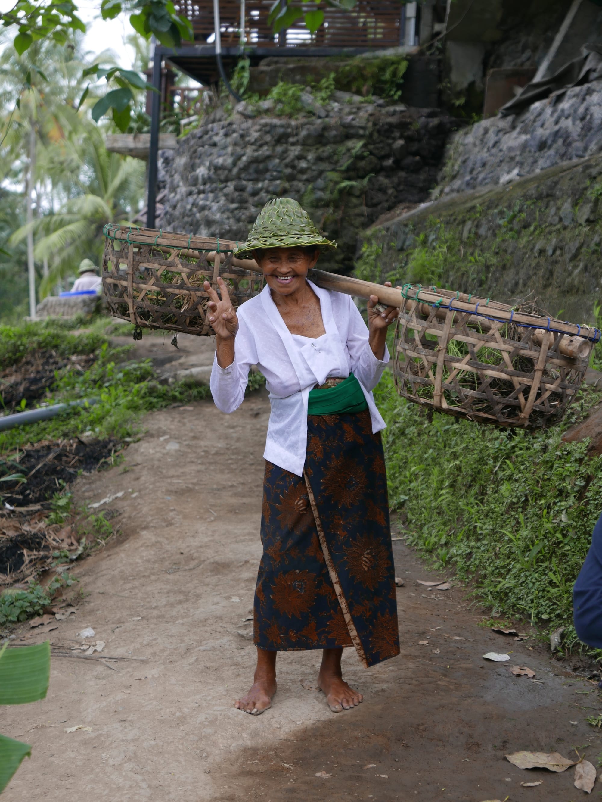 Photo by Author — a model posing for a photograph at the Tegallalang Rice Terraces, Bali, Indonesia