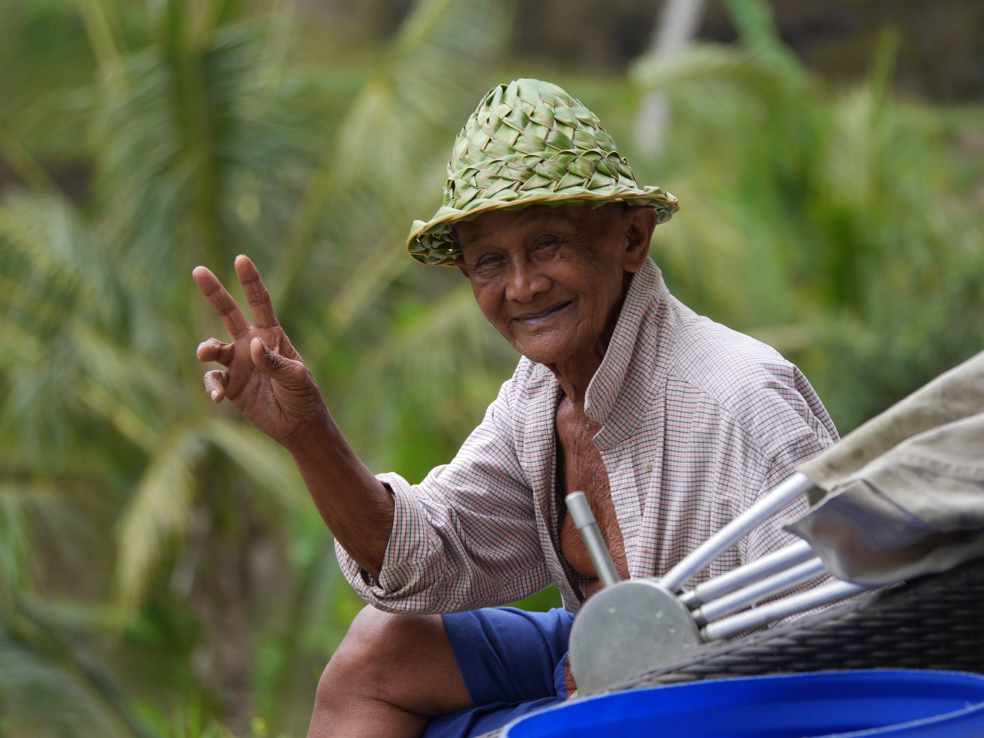 Photo by Author — a model posing for a photograph at the Tegallalang Rice Terraces, Bali, Indonesia