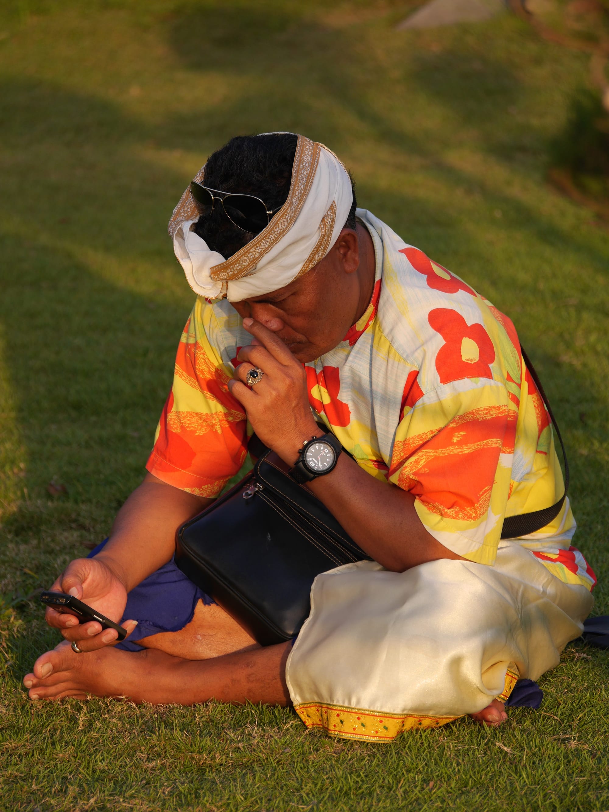 Photo by Author — a taxi driver waiting for his passengers — Tanah Lot, Bali, Indonesia