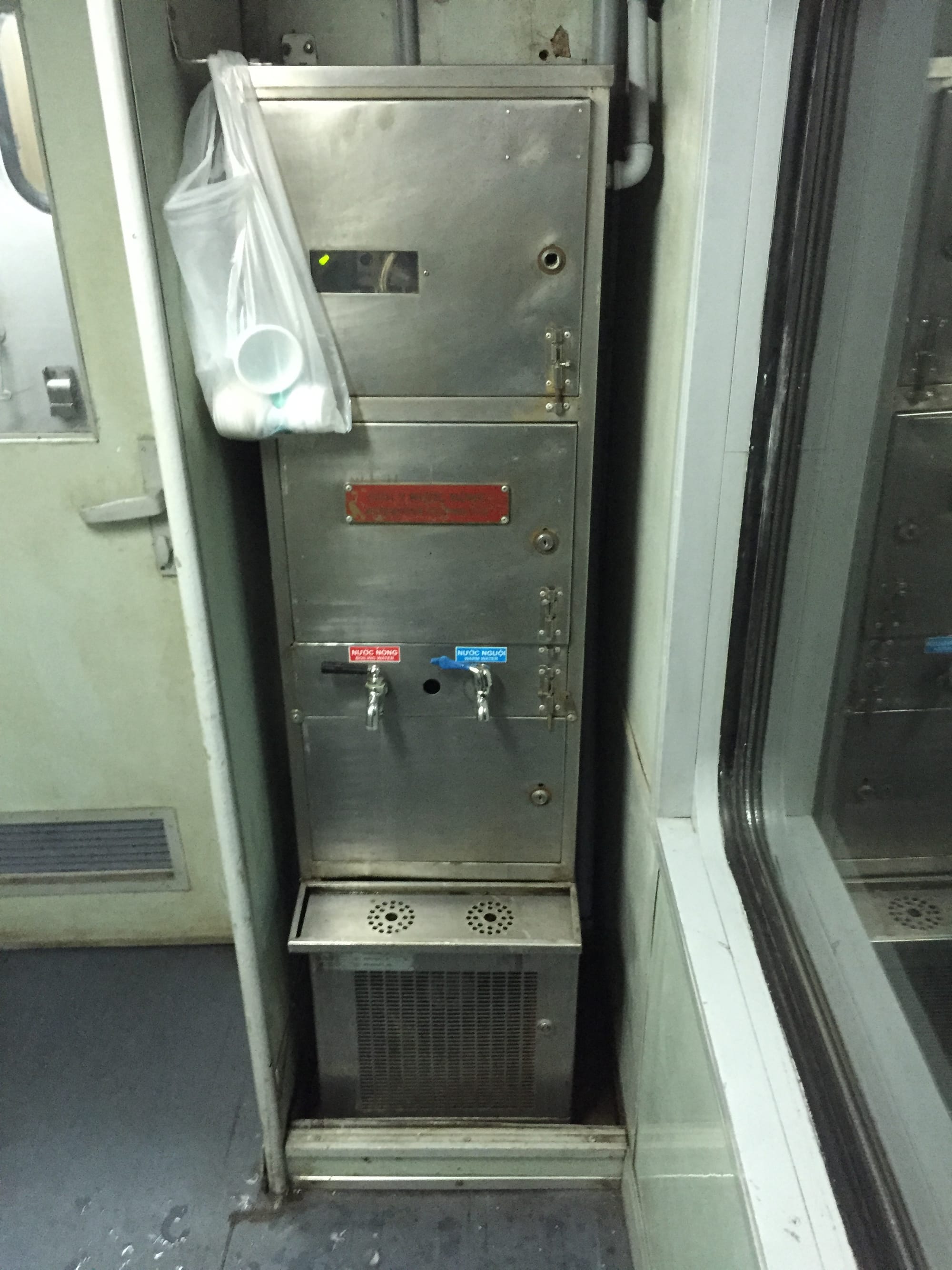 Photo by Author — the hot water station on the Reunification Railway, Vietnam, for making tea and heating noodles