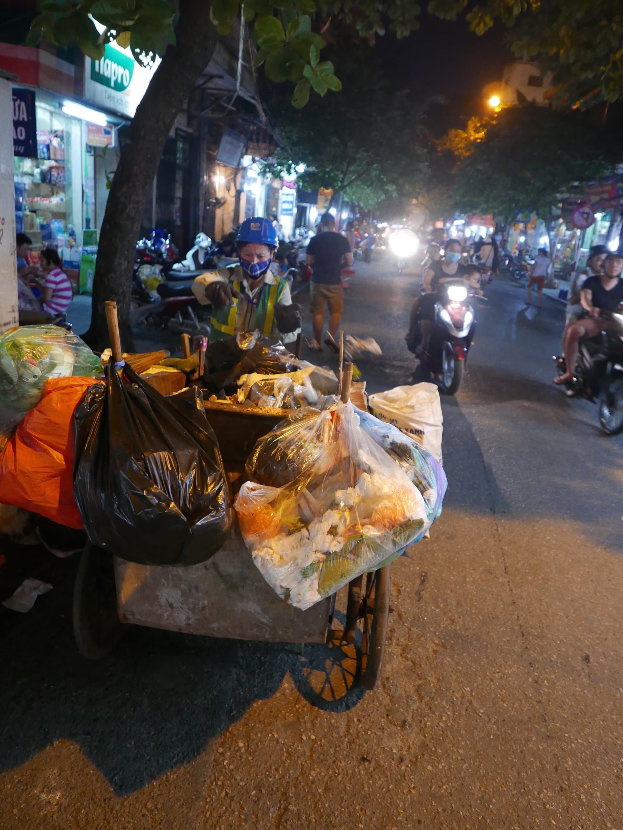 Photo by Author — street cleaner — Hanoi, Vietnam