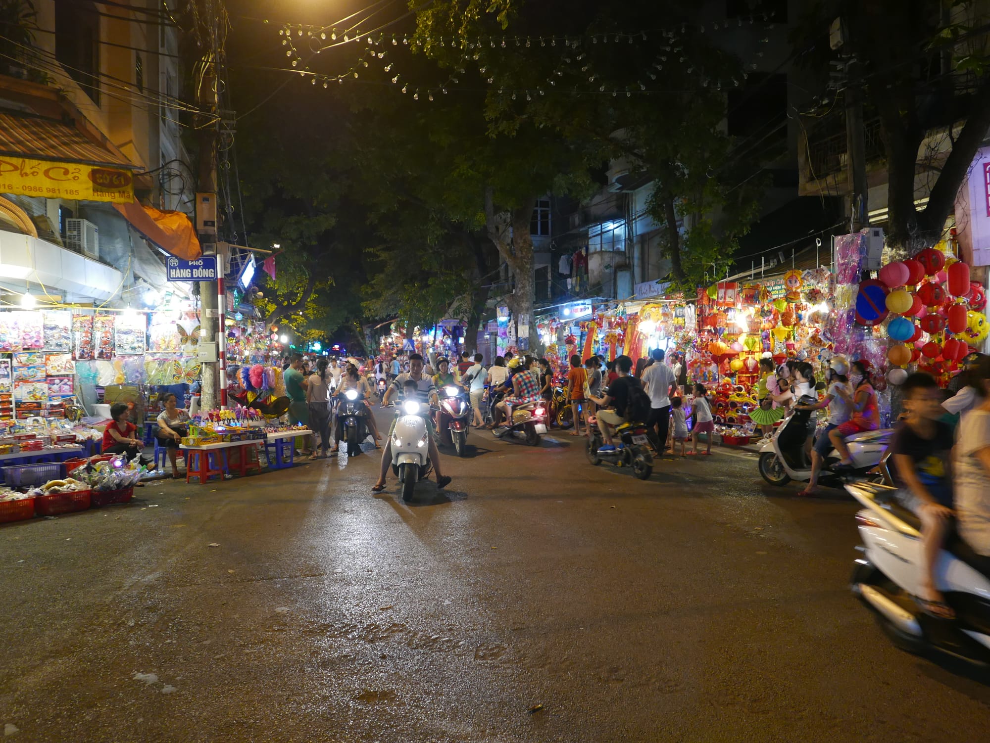 Photo by Author — motorbikes at night — Hanoi, Vietnam