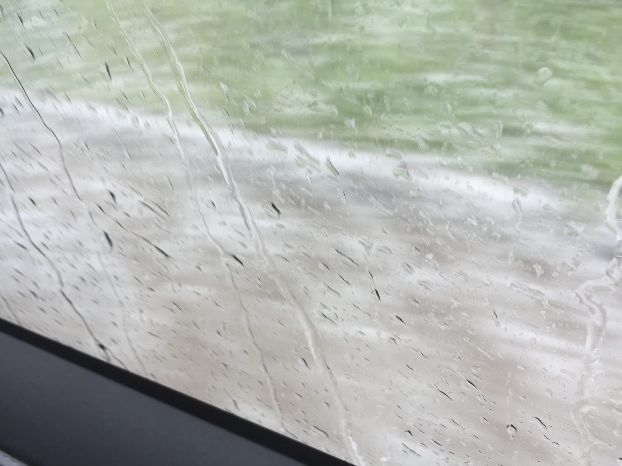 Photo by Author — driving through the floods and rain to Ha Long Bay, Vietnam