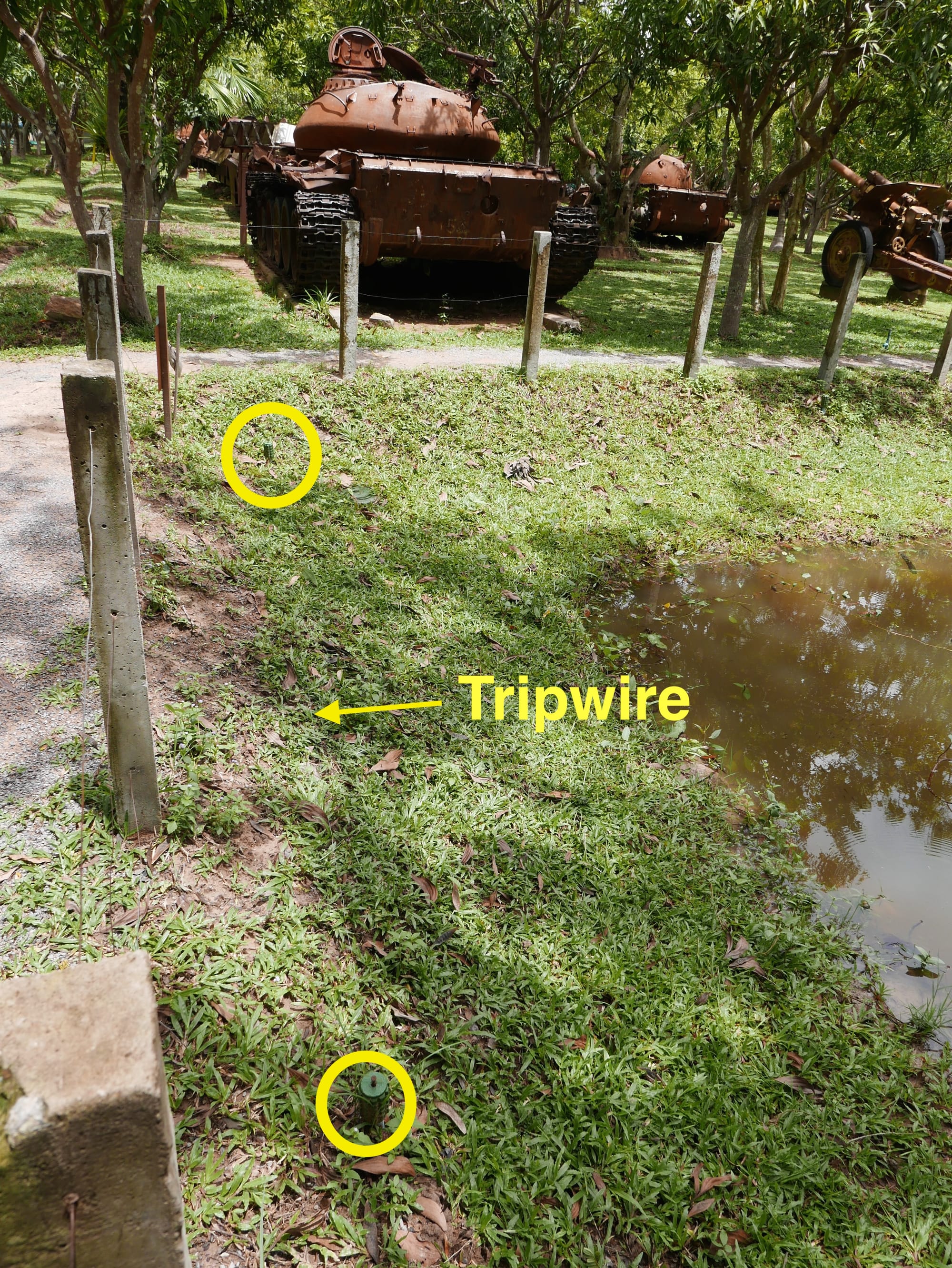 Photo by Author — spot the anti-personnel mines and tripwire — War Museum, Siem Reap, Cambodia