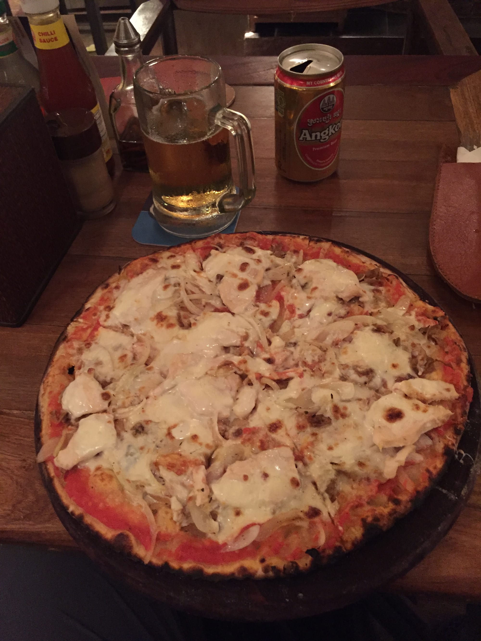 Photo by Author — chicken curry pizza at Café Latino, Pub Street, Siem Reap, Cambodia — possibly the most insipid pizza I have ever eaten