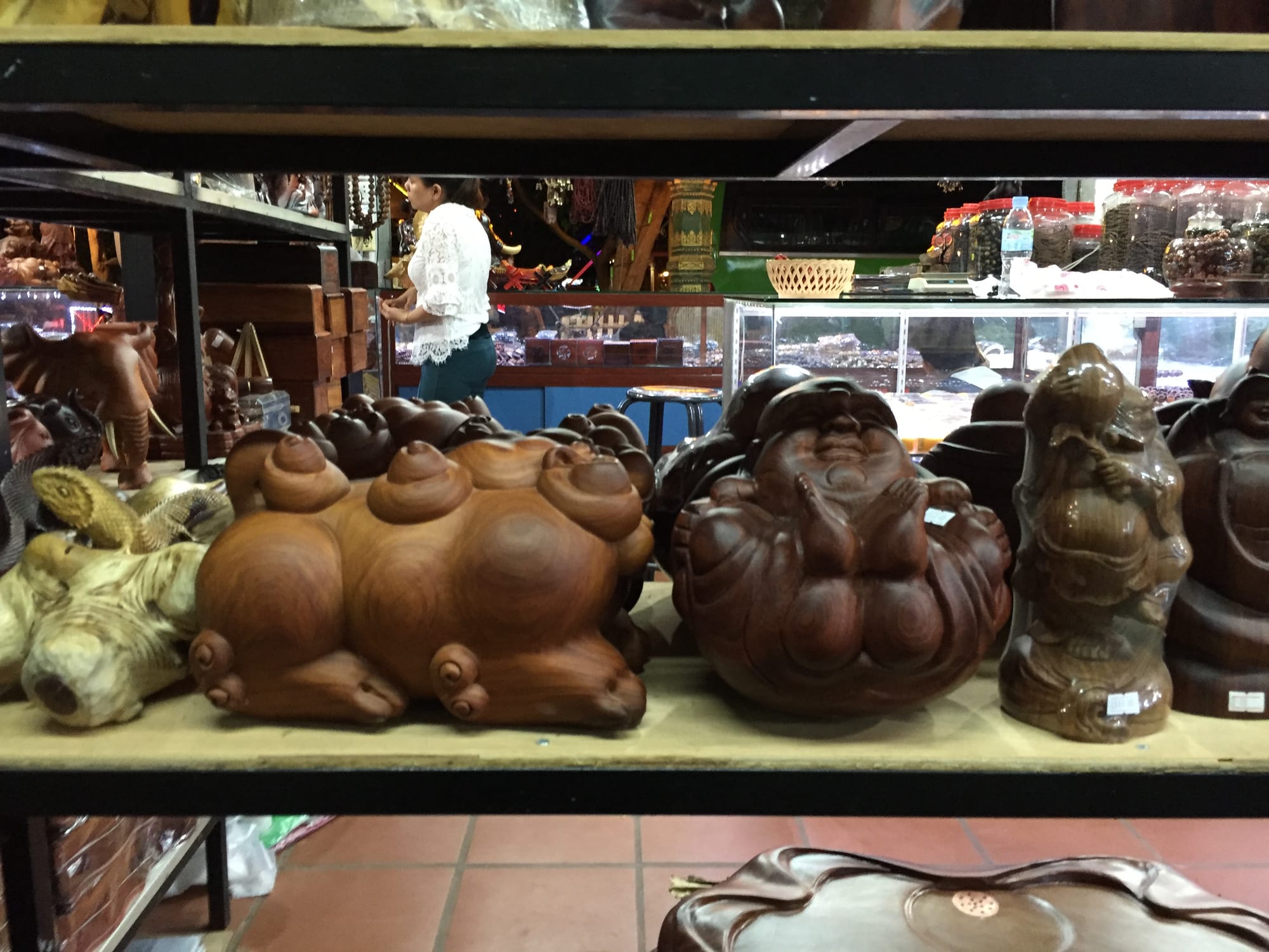 Photo by Author — more carvings for sale at the Art Centre Night Market, Siem Reap, Cambodia