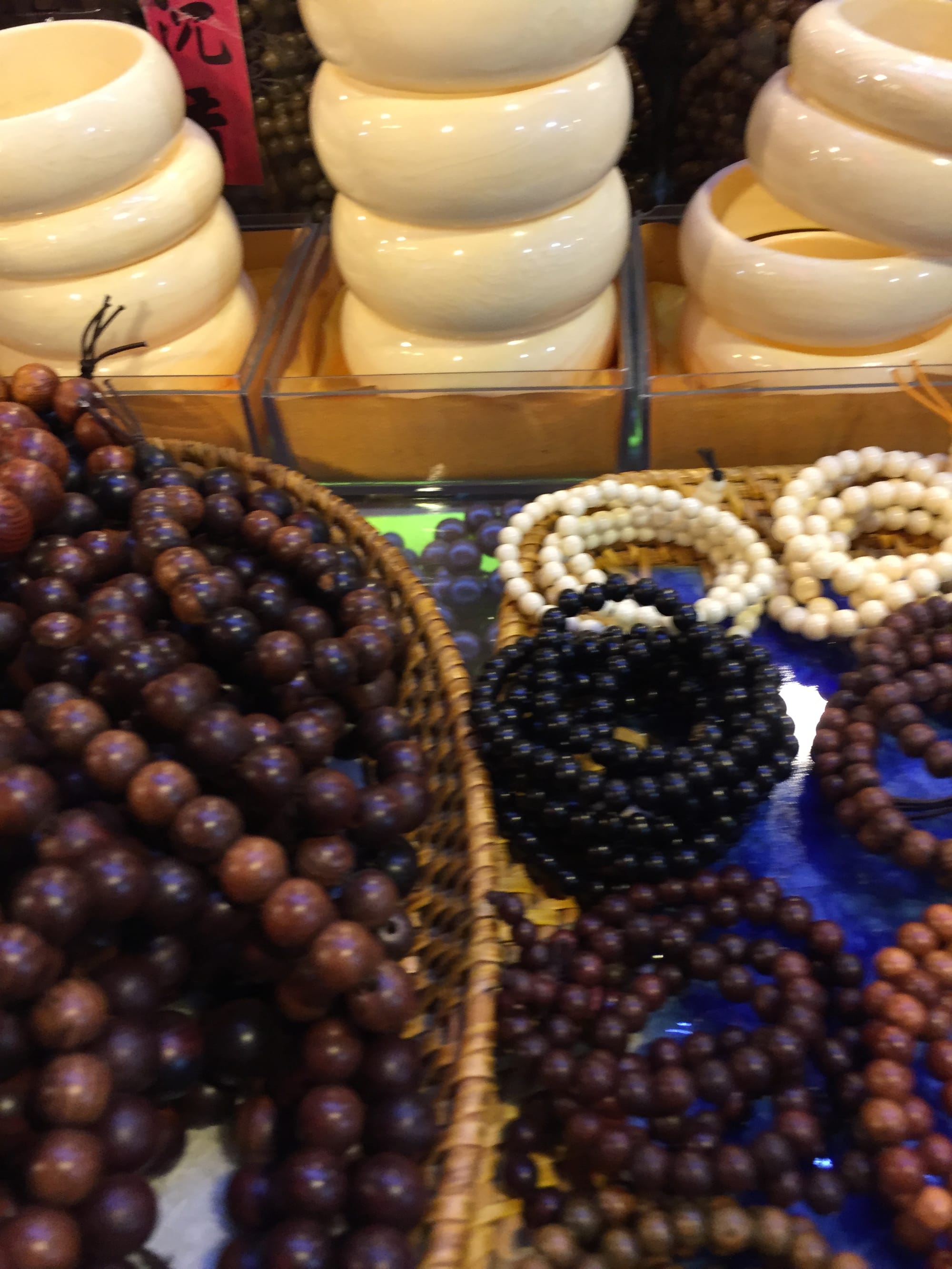 Photo by Author — bracelets and beads at the Art Centre Night Market, Siem Reap, Cambodia