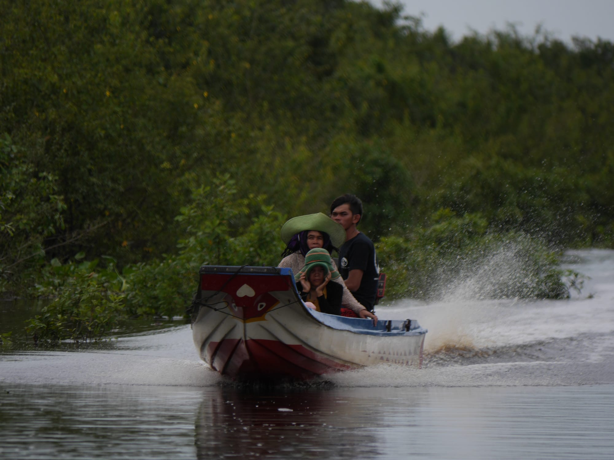 Photo by Author — a speeding boat — Mechrey Floating Village, Siem Reap, Cambodia