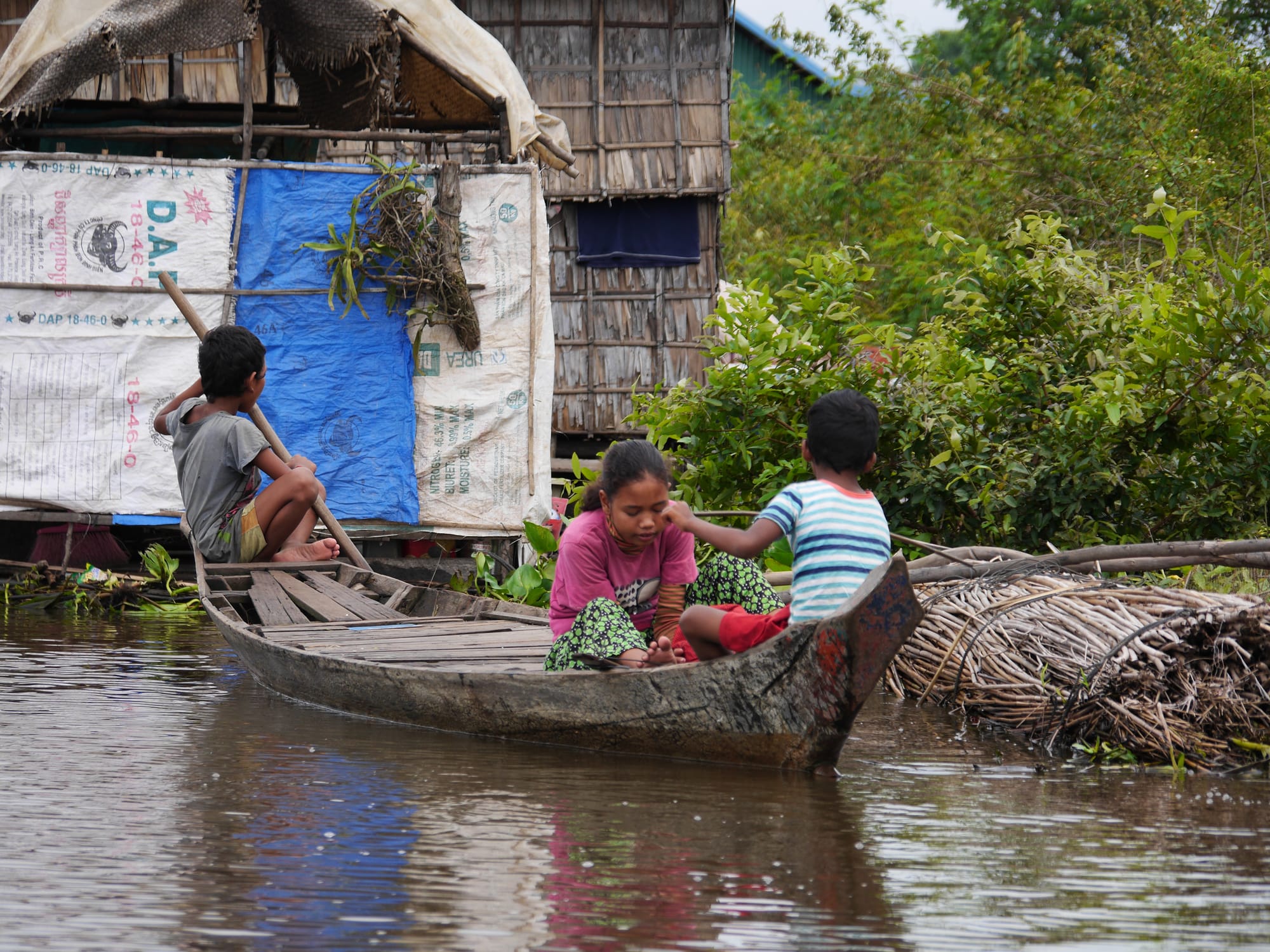 Photo by Author — villagers — Mechrey Floating Village, Siem Reap, Cambodia